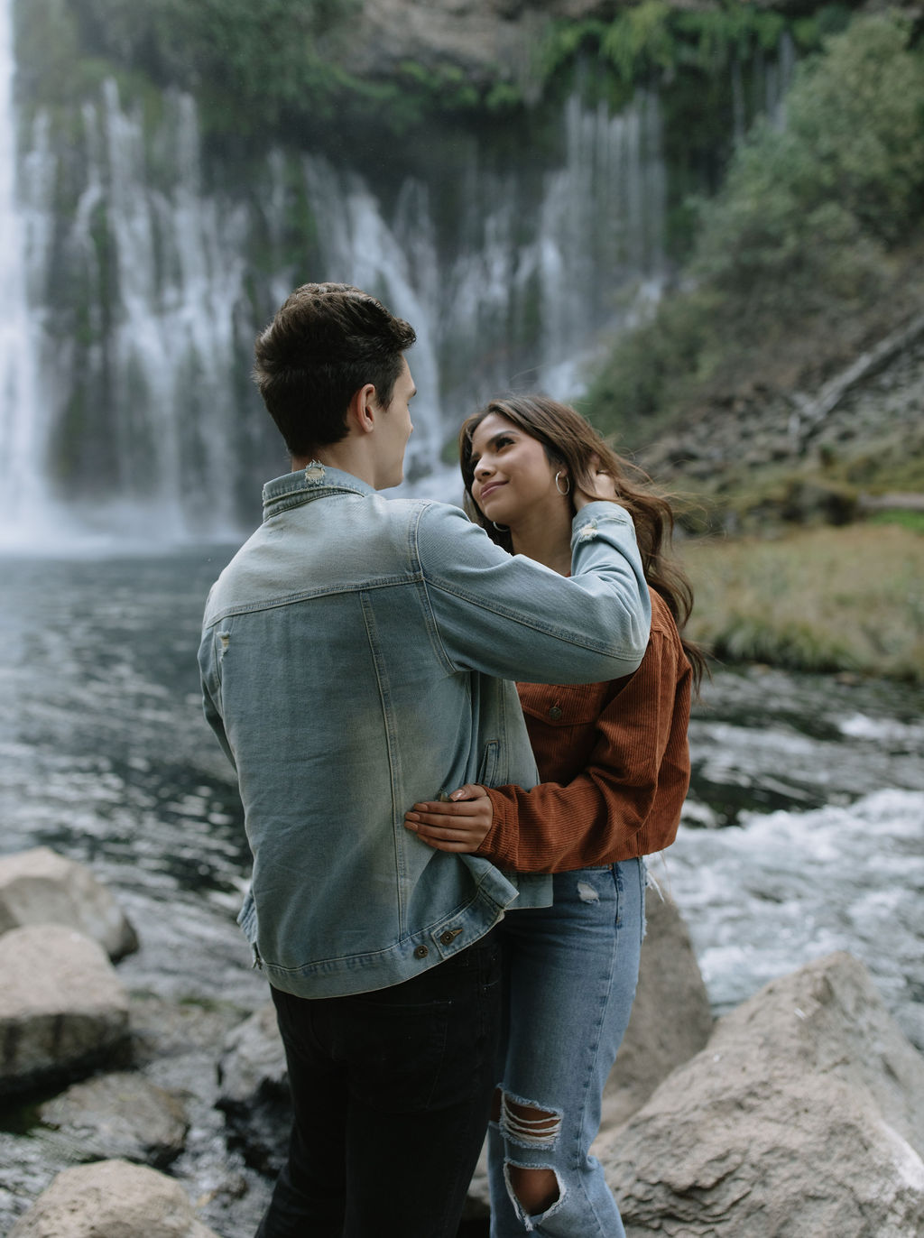 Girl looking at her fiancé lovingly during their engagement photoshoot