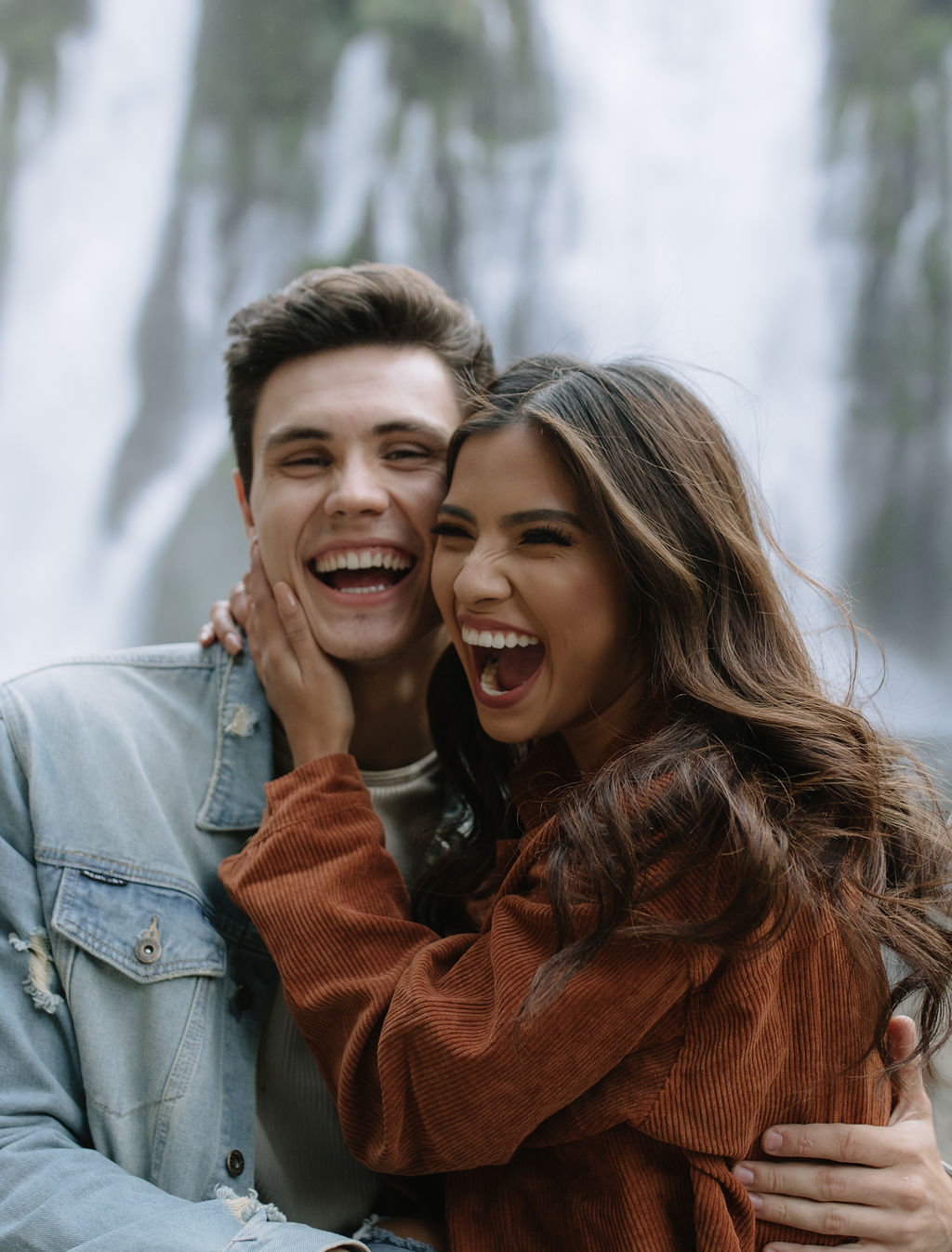 Couple laughing in candid photo