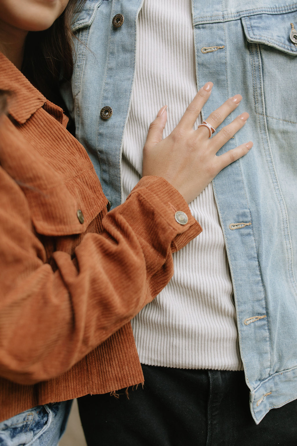 Engagement photoshoot pose idea of up close photo of bride's hand