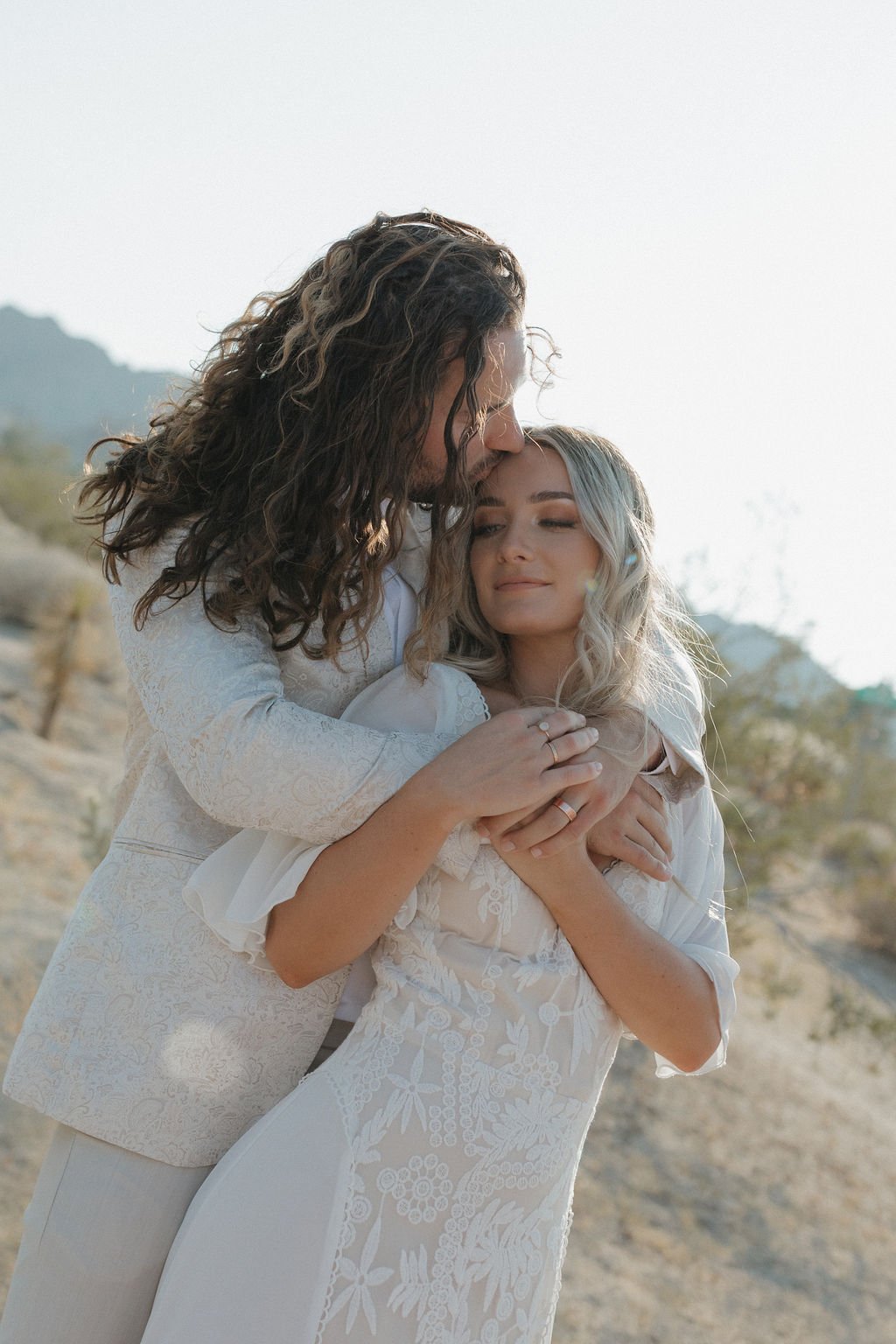 A bride and groom in Joshua tree