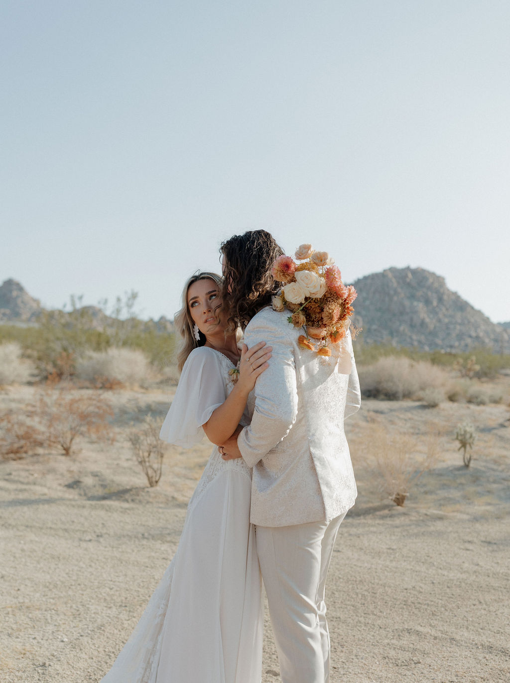 A bride and groom in Joshua tree