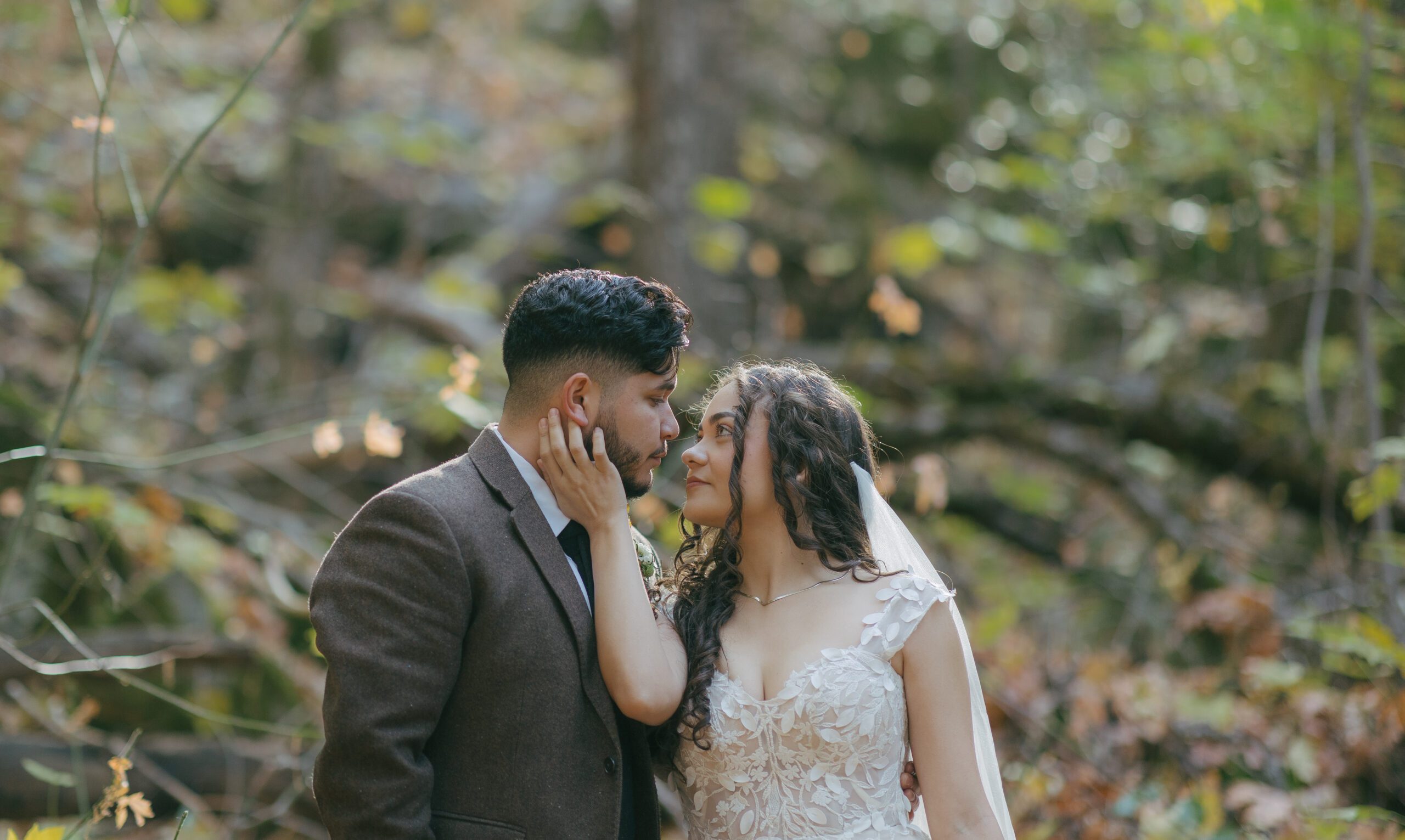 Bride and groom photo of them looking lovingly at each other at Yosemite wedding