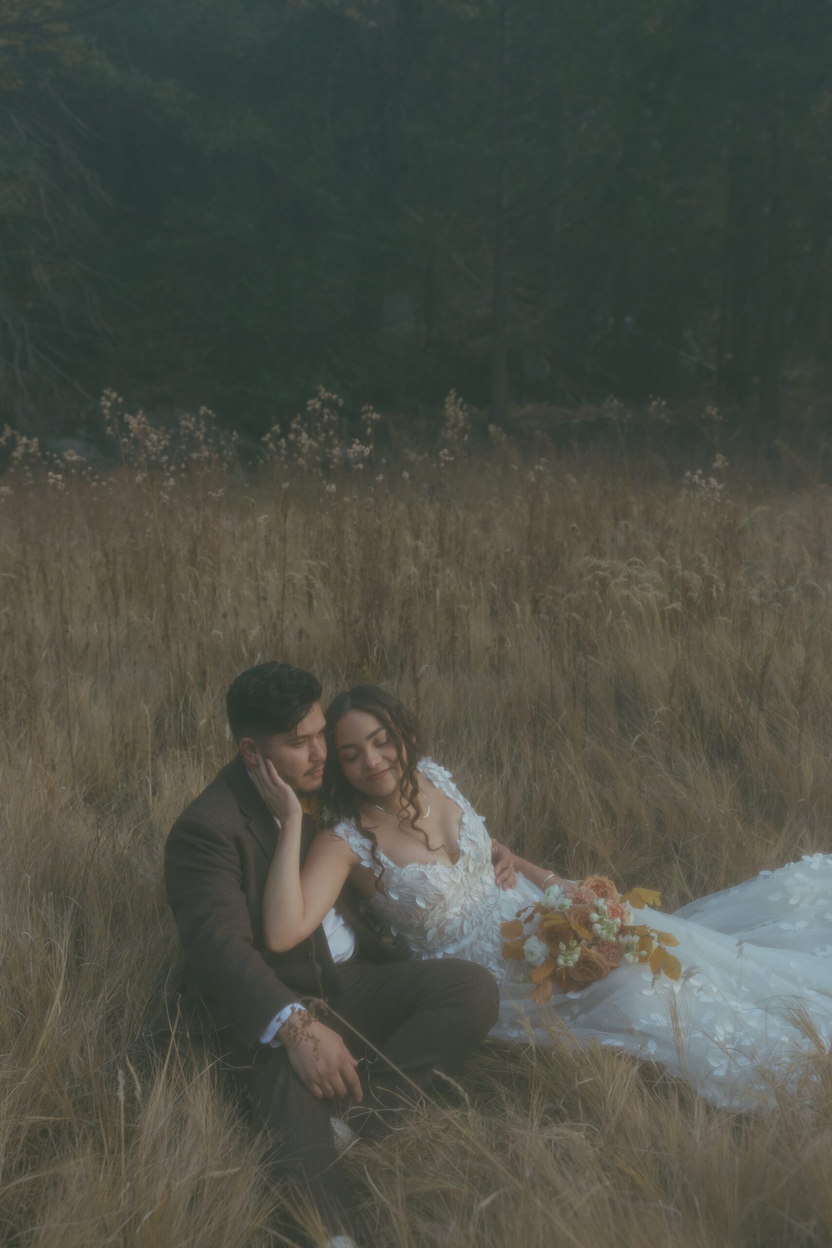 Editorial bride and groom photo in field at Yosemite Park elopement
