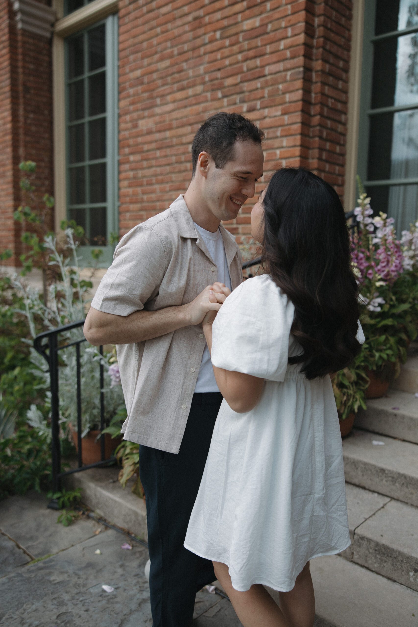 Couple looking at each other in romantic engagement photo