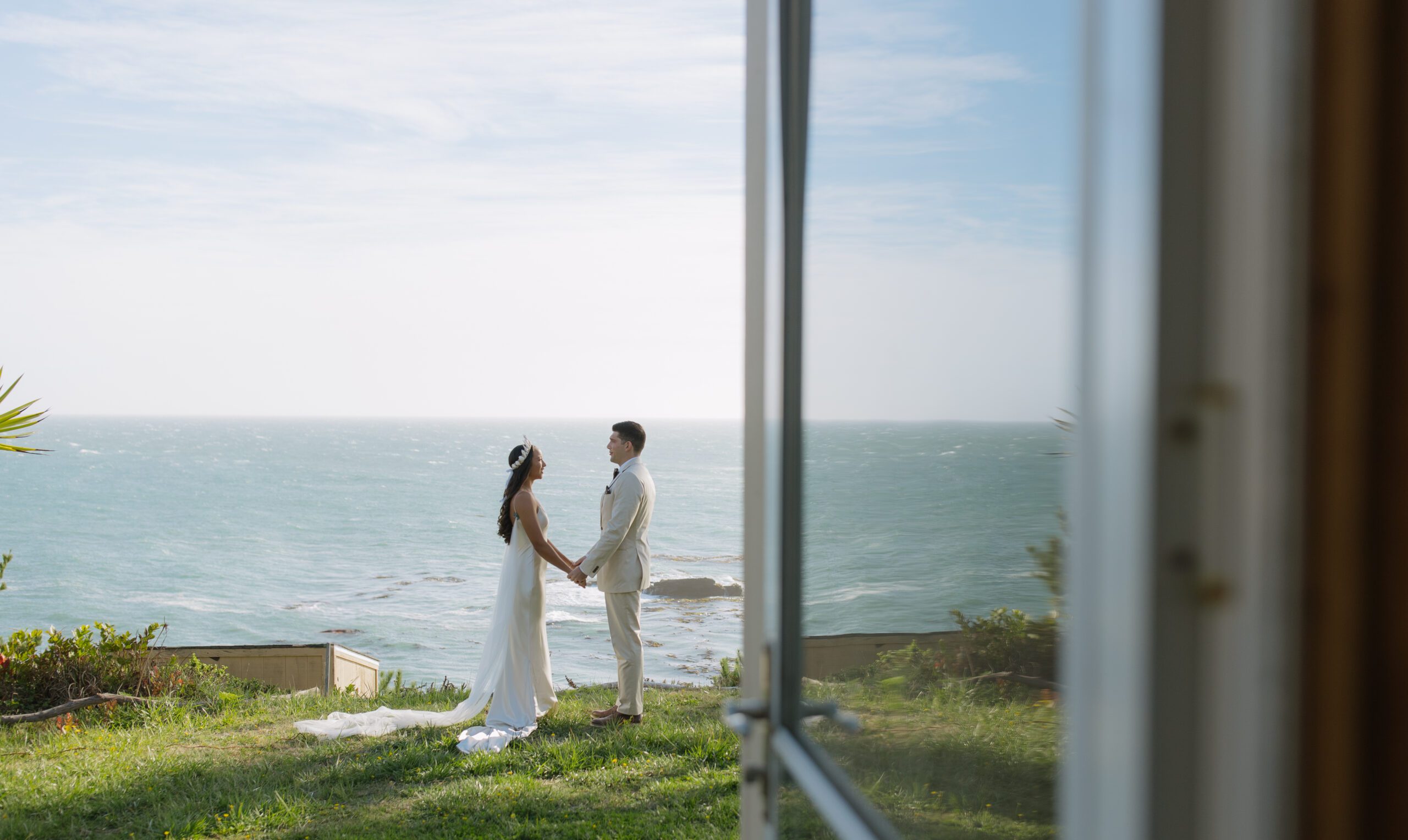Bride and groom sharing private vows at Bay Area oceanfront wedding
