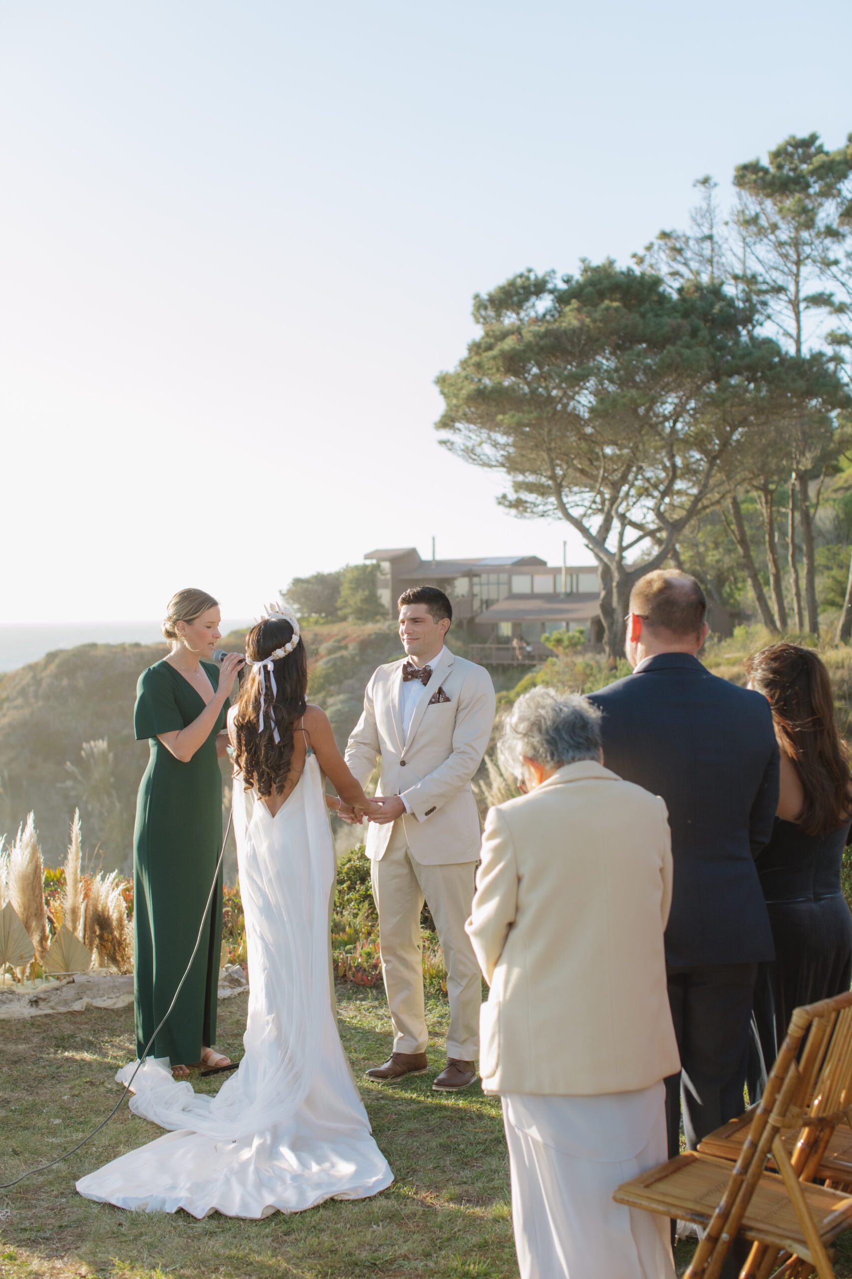 Bride and groom holding hands during intimate ceremony at Bay Area wedding