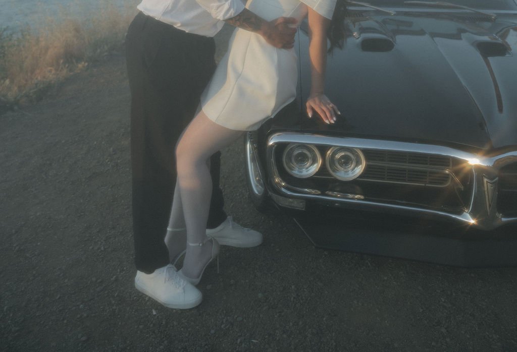 Hazy engagement photos with a classic car