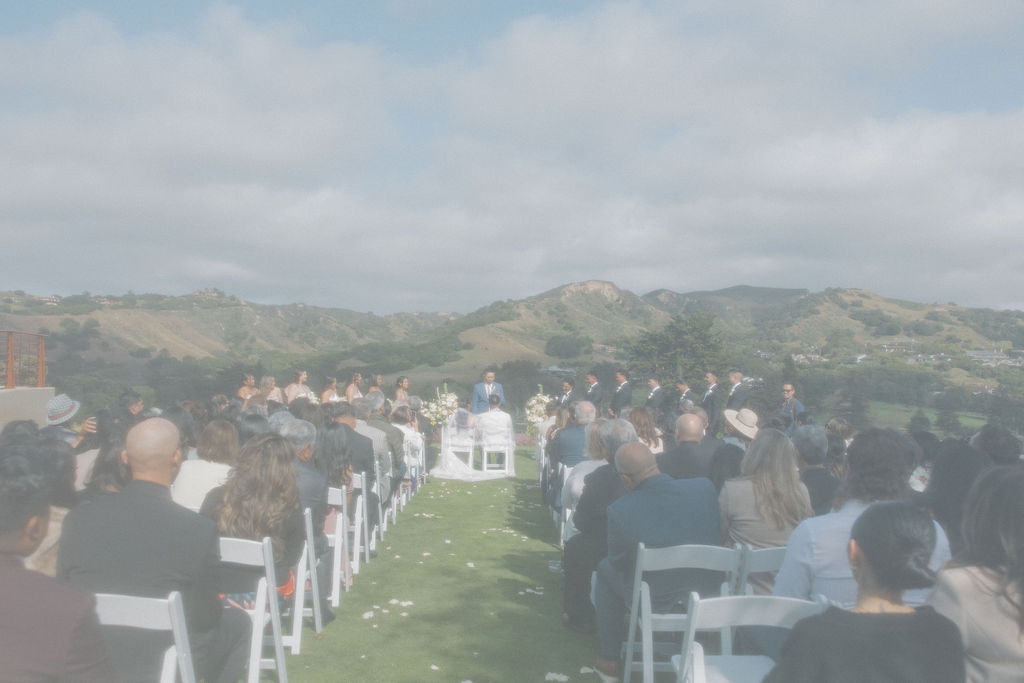 Editorial grainy wedding photo of ceremony