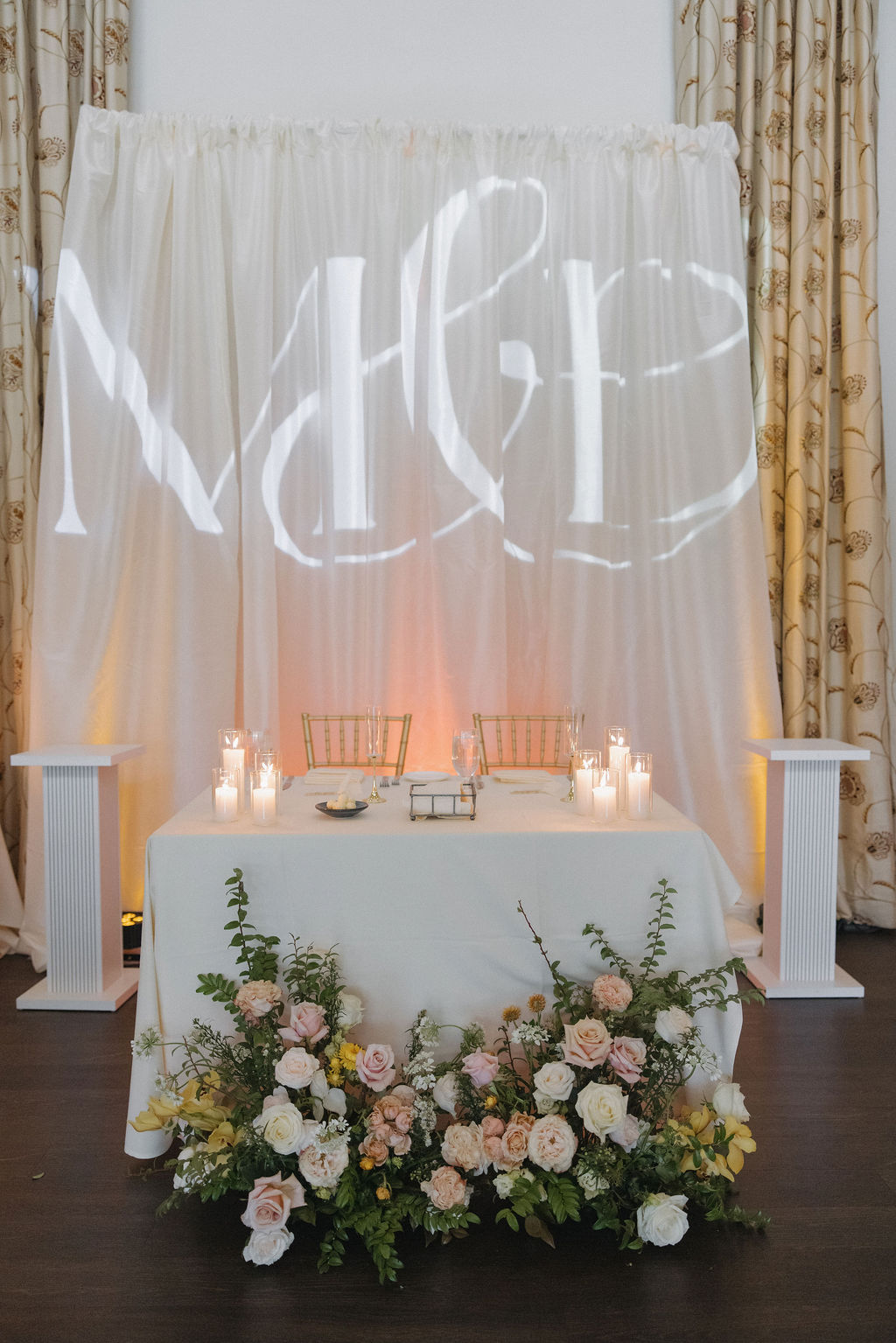 Wedding sweetheart table setup at wedding reception