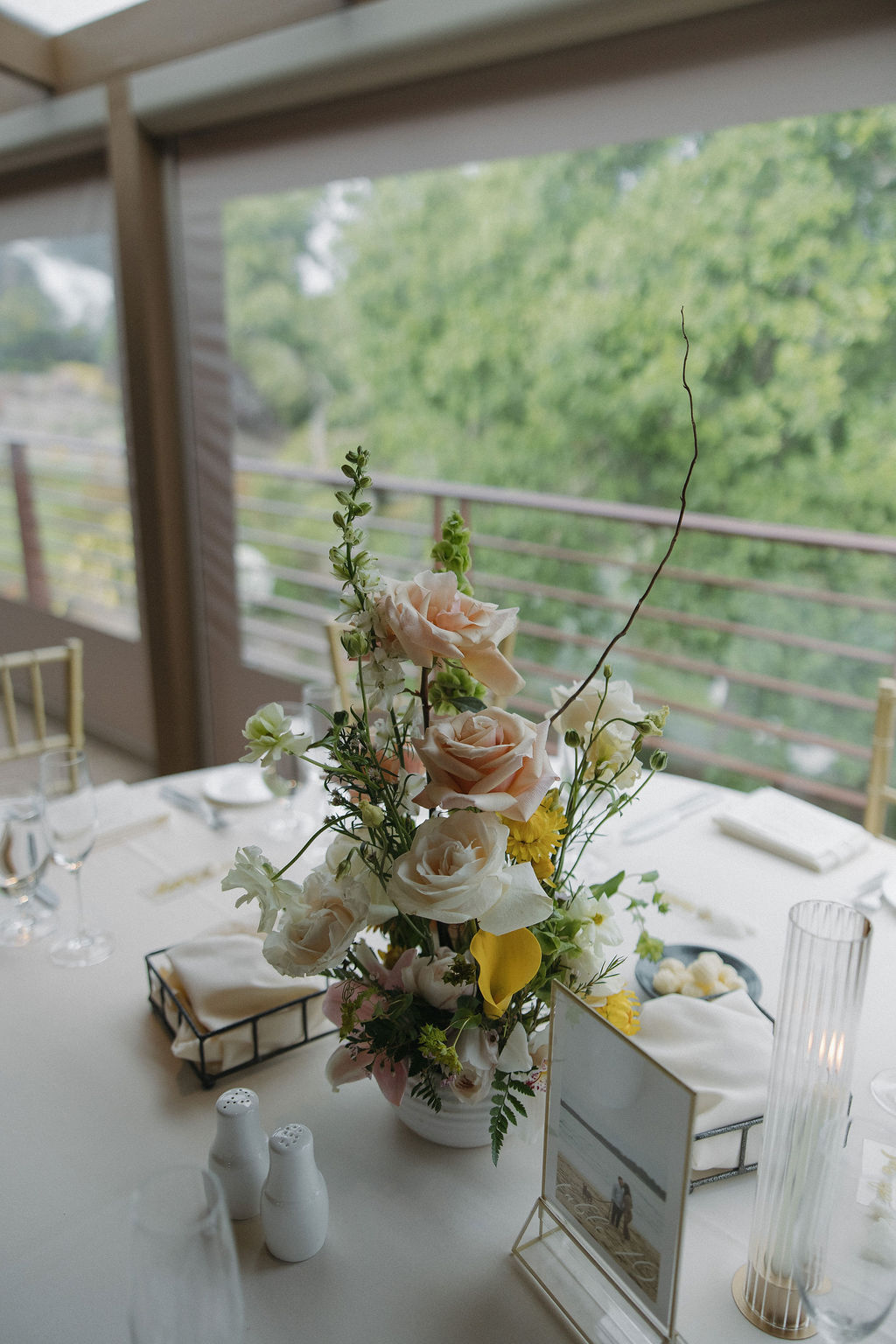 Reception table setup at California wedding with pastel centerpieces