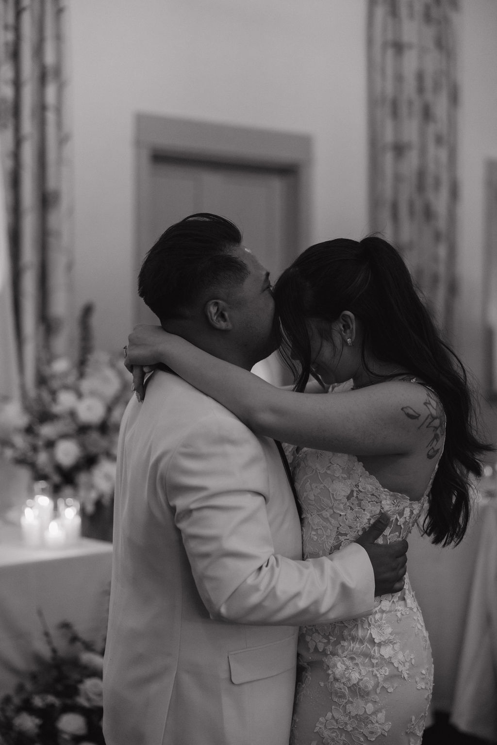 Black and white photo of couple sharing first dance