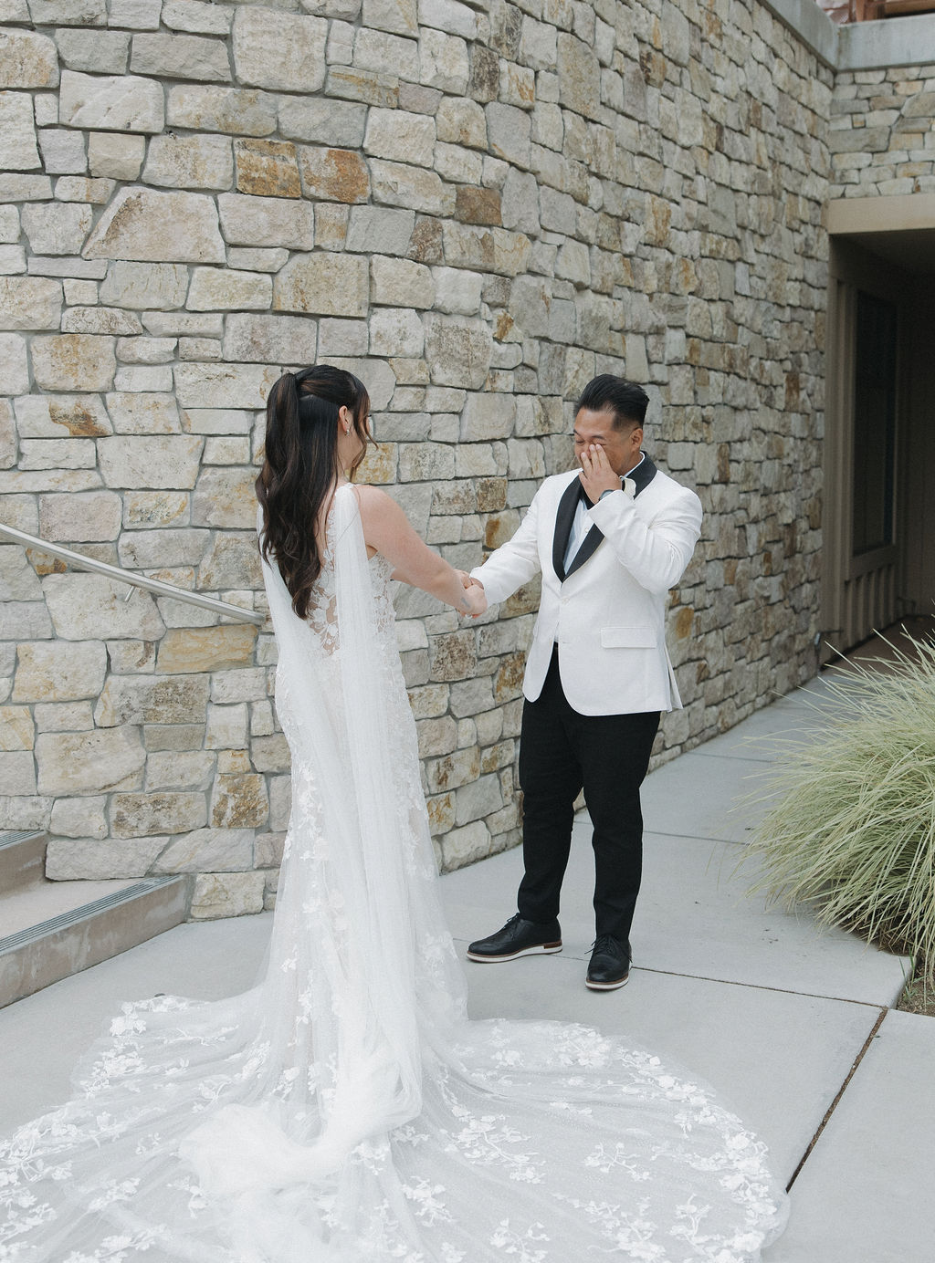 Groom crying during wedding first look photos