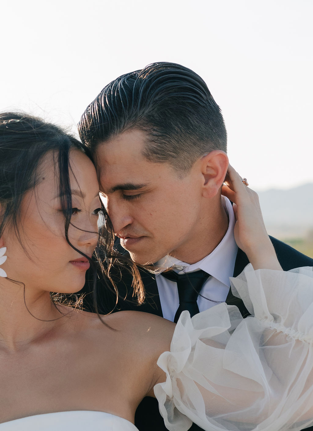 Close up photo of bride and groom during outdoor elopement