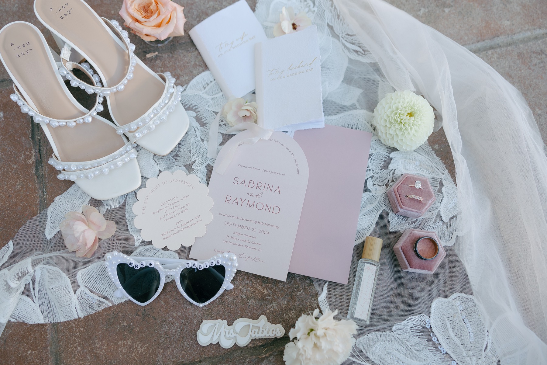 Wedding flatly photo with wedding shoes, wedding invitations, and wedding flowers from pink luxury wedding