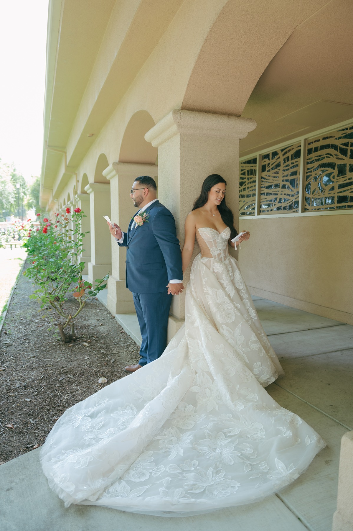 Bride and groom sharing a private first touch