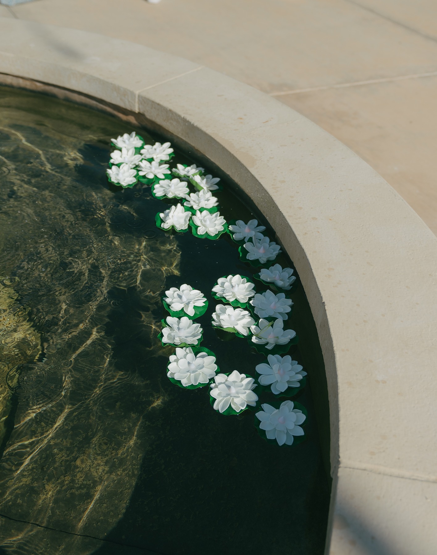 Lilypads in a fountain at a luxury wedding