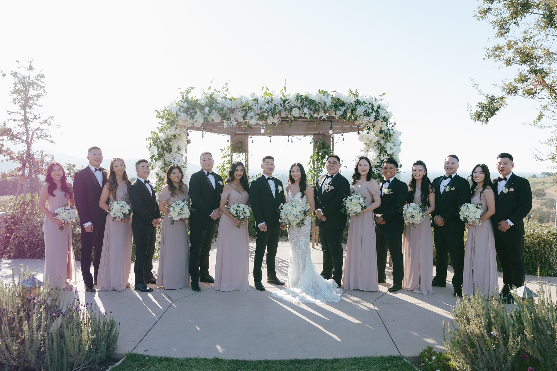 Bridal party photo with groomsmen and bridesmaids interchanged