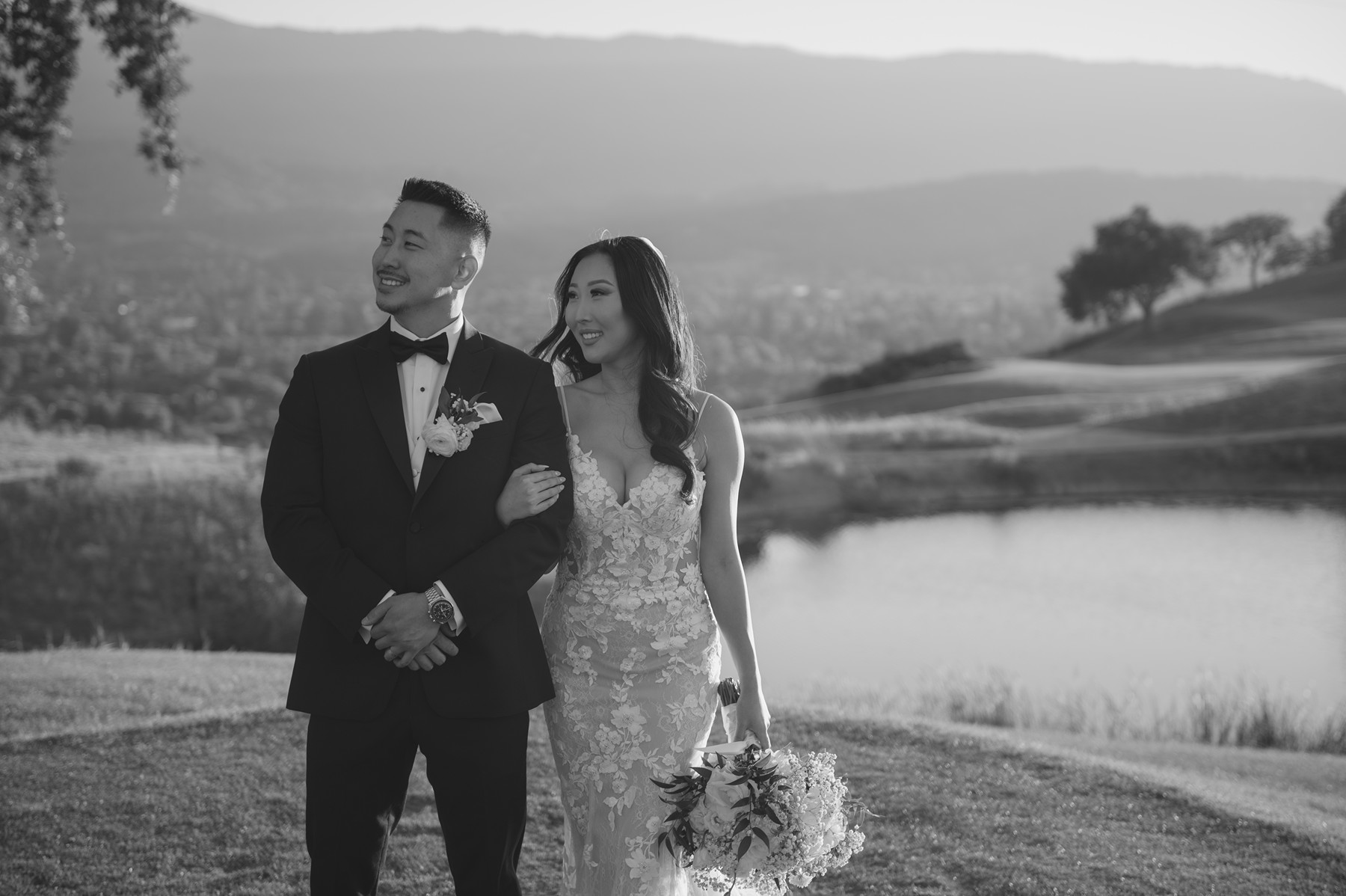 Black and white photo of bride and groom on a golf course San Jose wedding venue