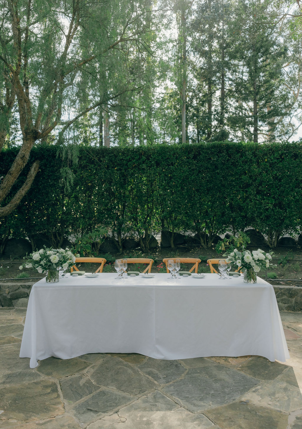 Sweetheart table setup for outdoor wedding reception