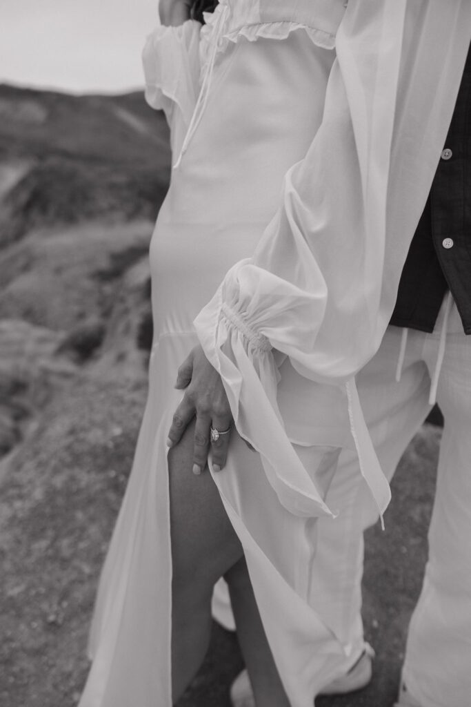 Flowy white dress for beach engagement photos