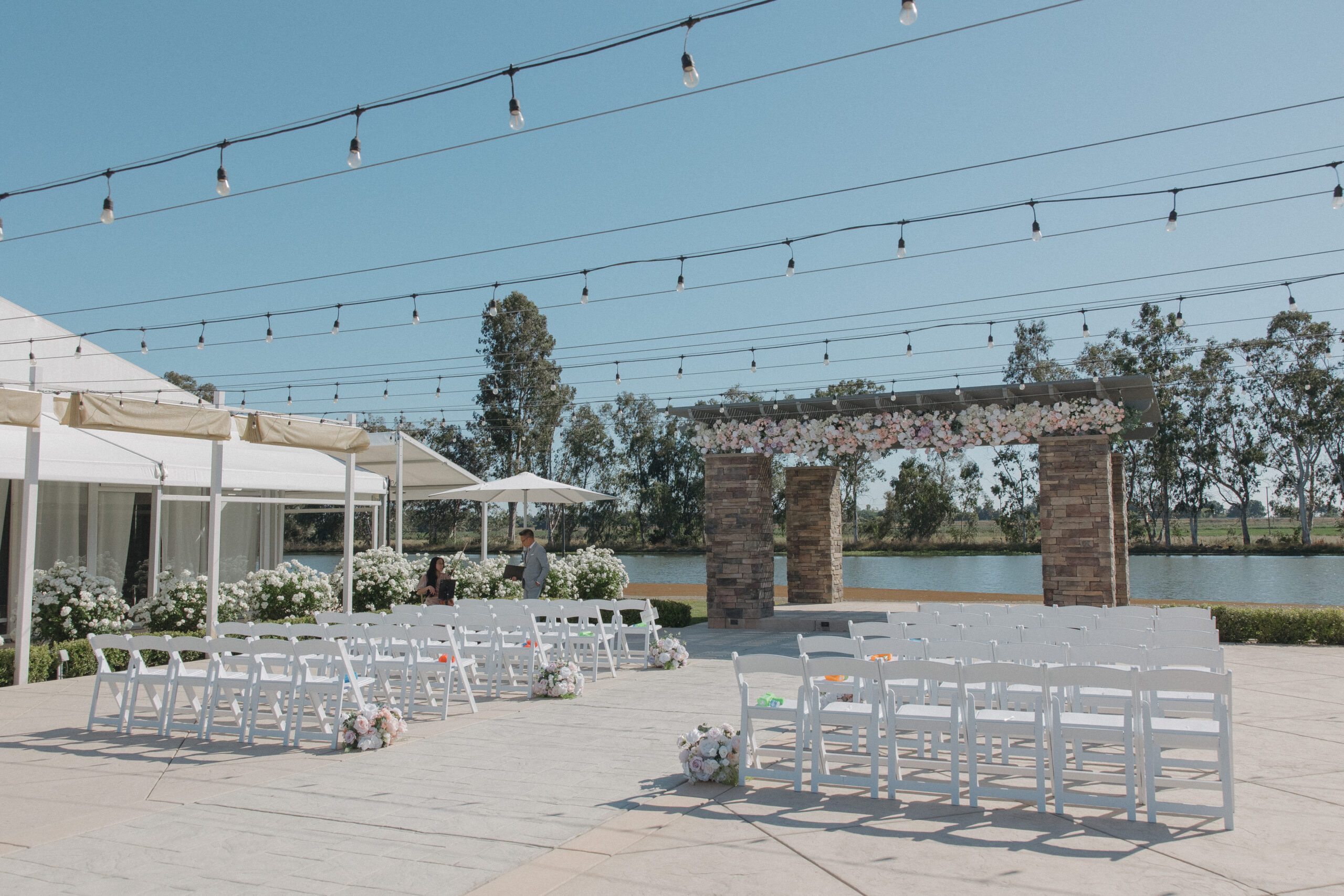 The wedding ceremony setup at a lakefront Sacramento wedding venue