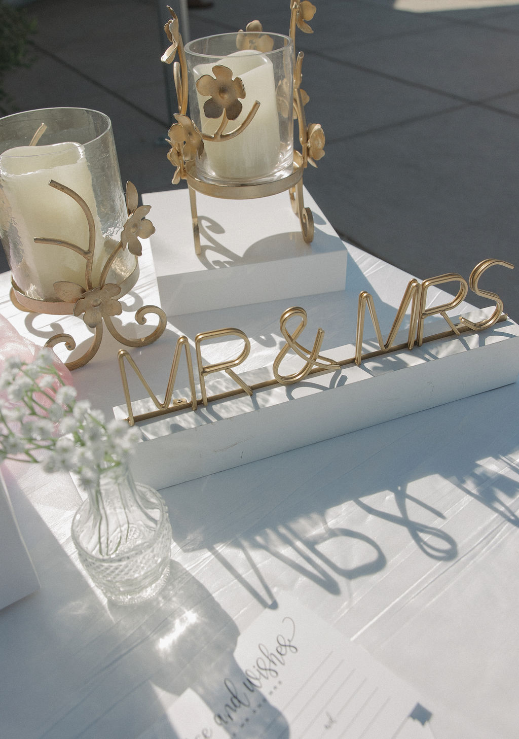 Wedding detail photos of mr. and mrs. sign on welcome table 
