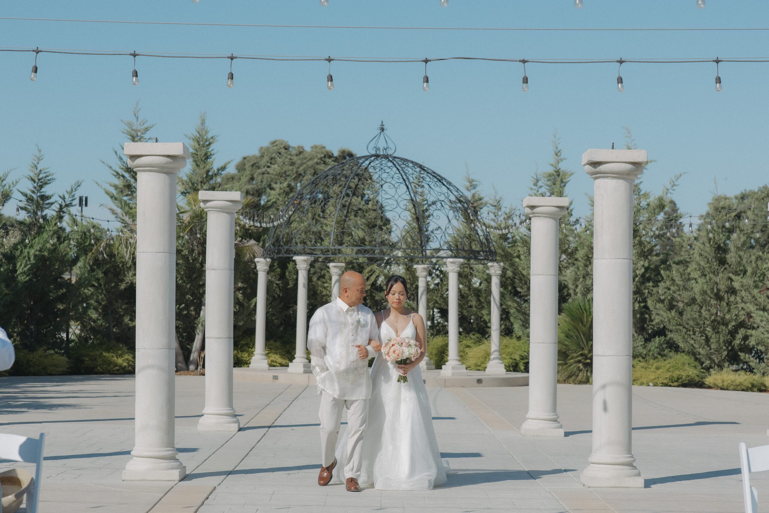 Bride's father walking her down the aisle