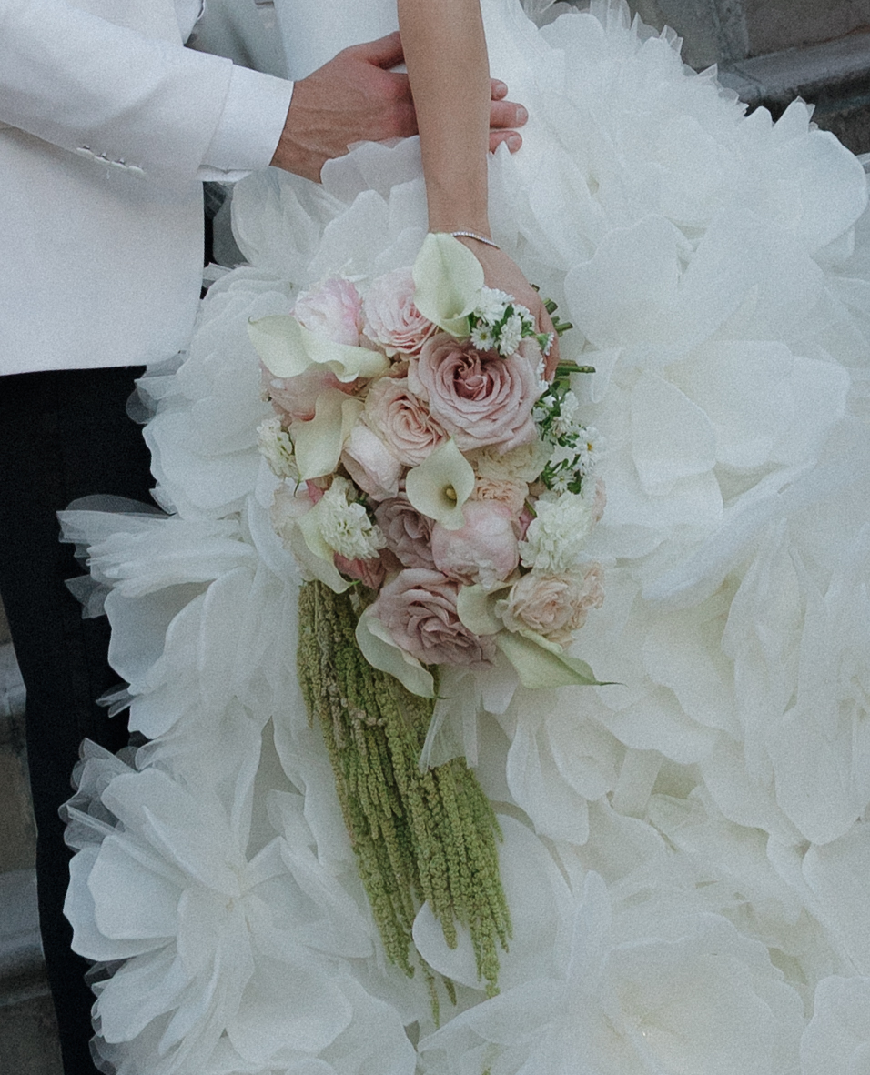 Bride's floral wedding bouquet with calla lilies
