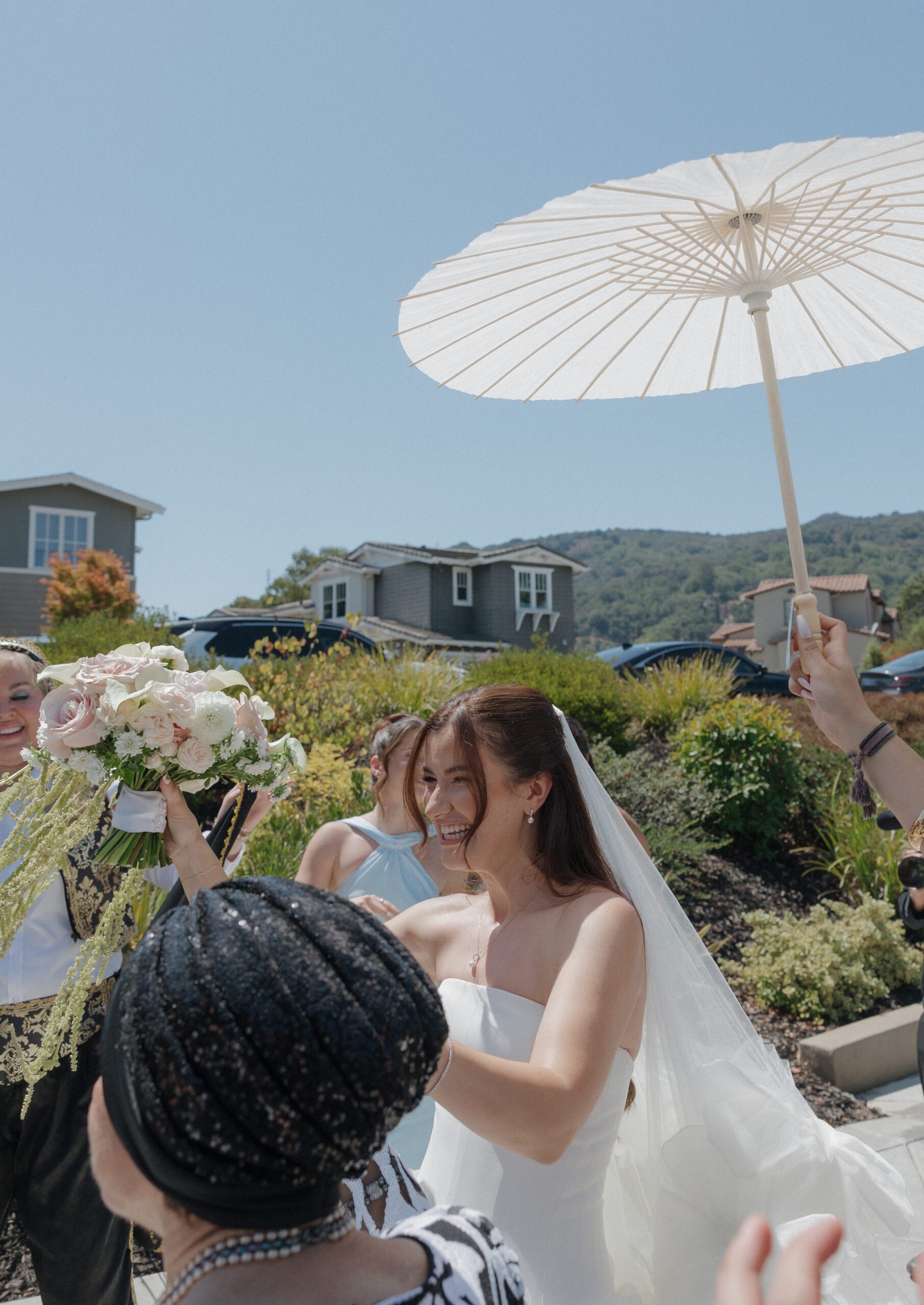Bride laughing in candid wedding photo