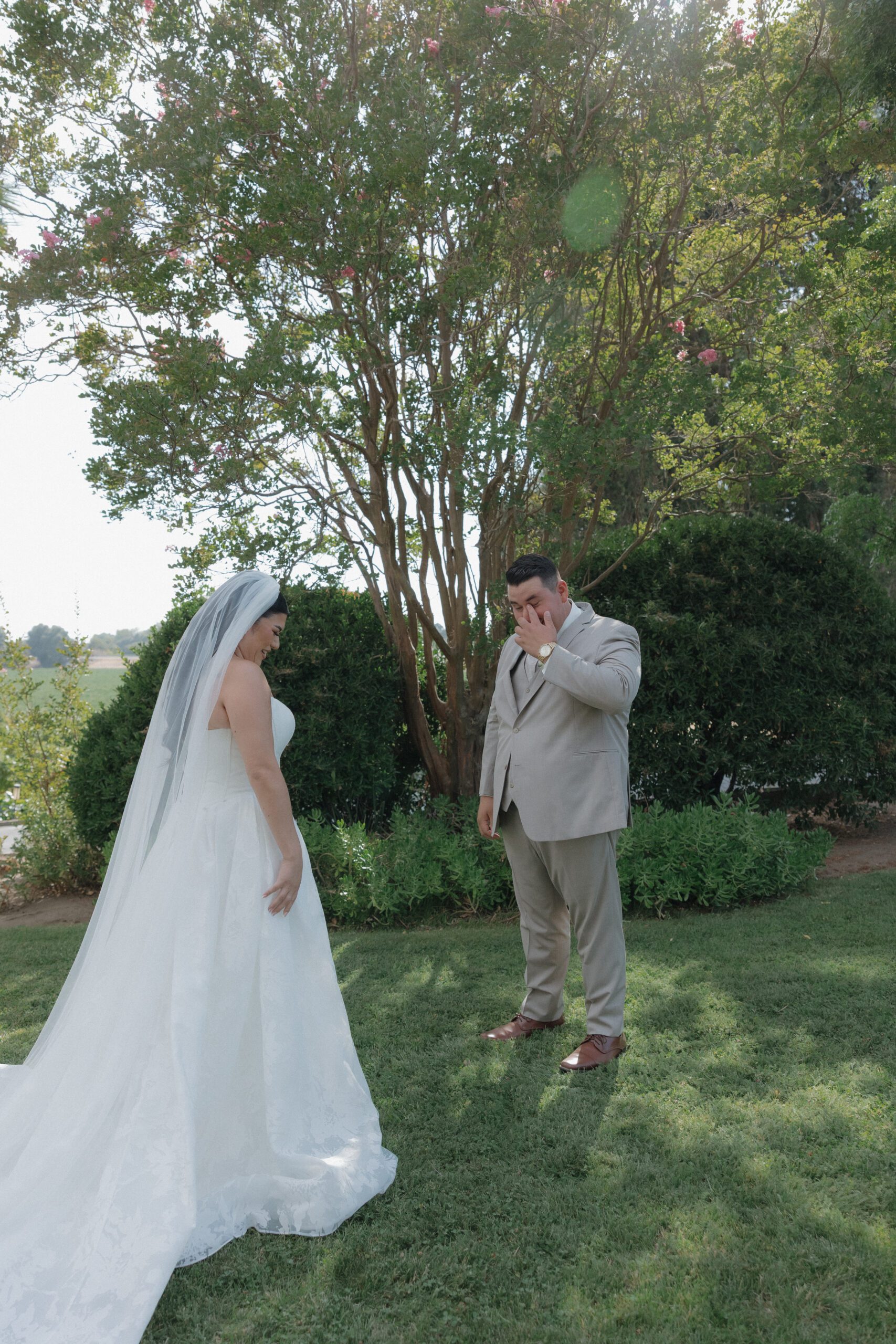 Groom crying during wedding first look photos