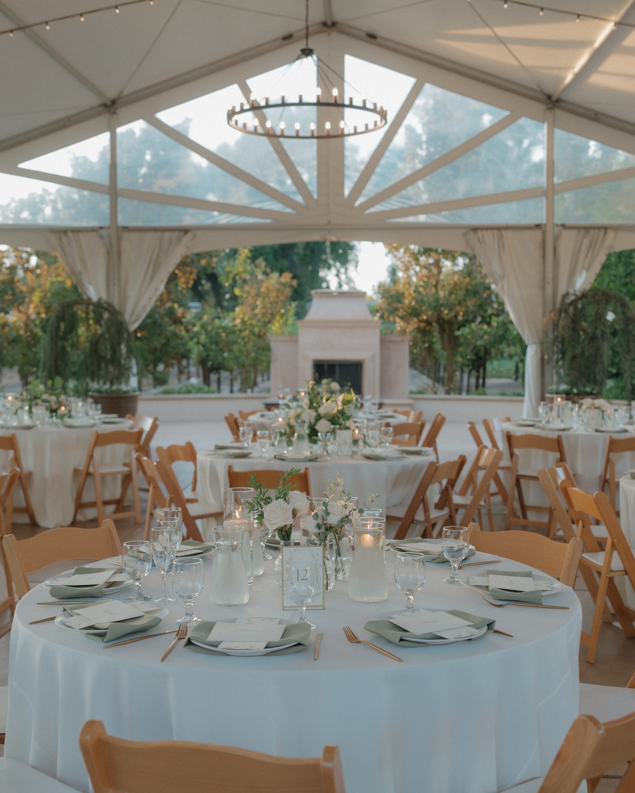 Wedding reception setup underneath tent