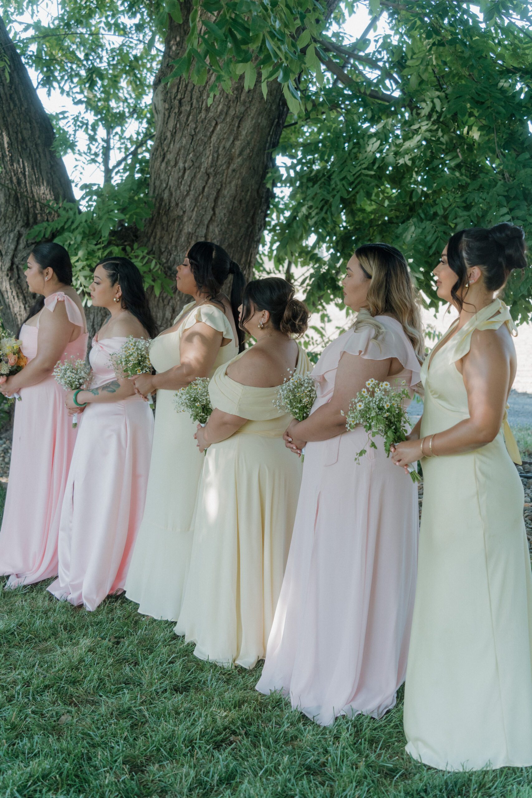 Pink and butter yellow bridesmaid dresses for a garden party wedding