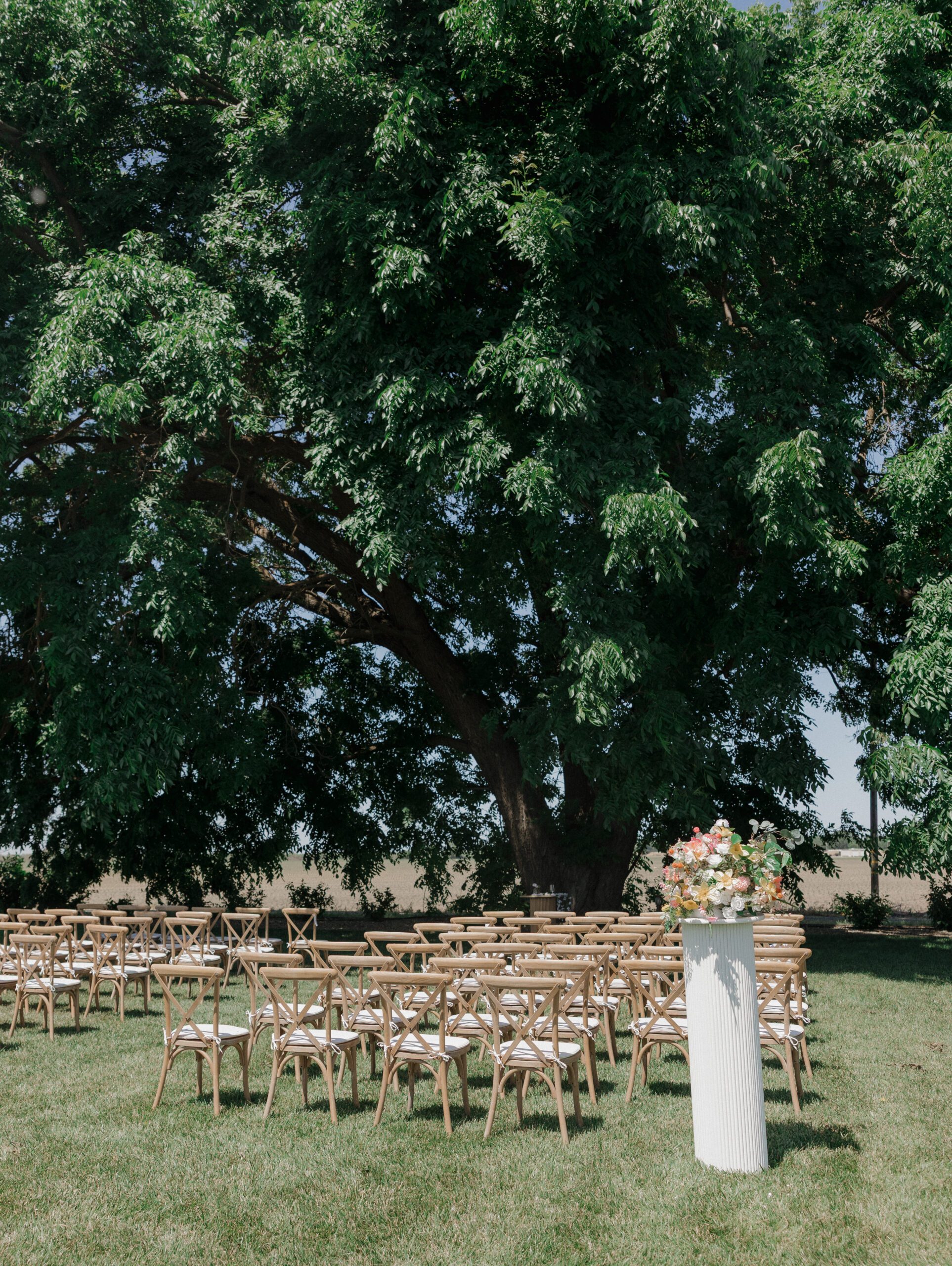 An outdoor wedding ceremony setup for a garden party wedding