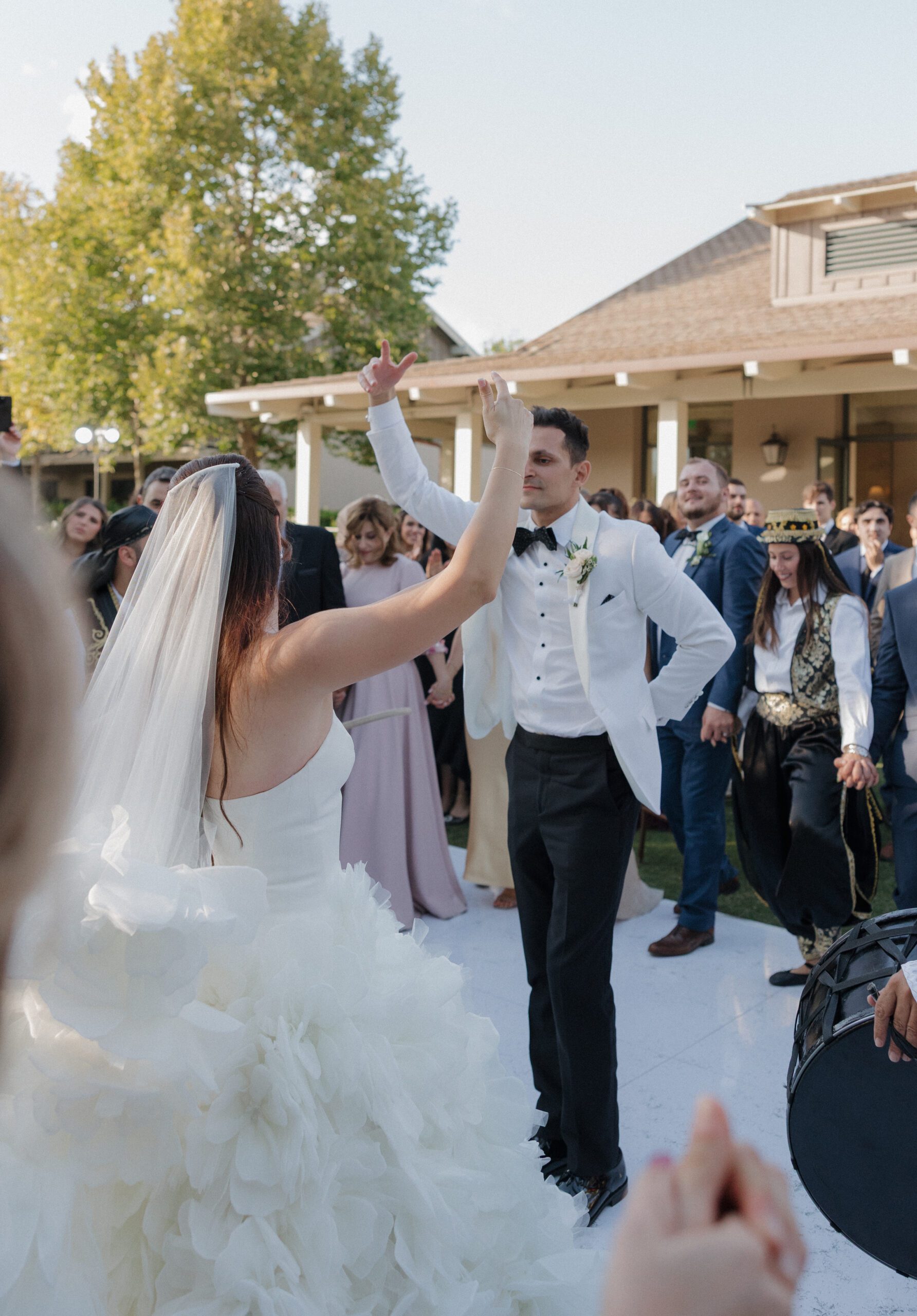 Bride and groom doing a choreographed dance at wedding reception