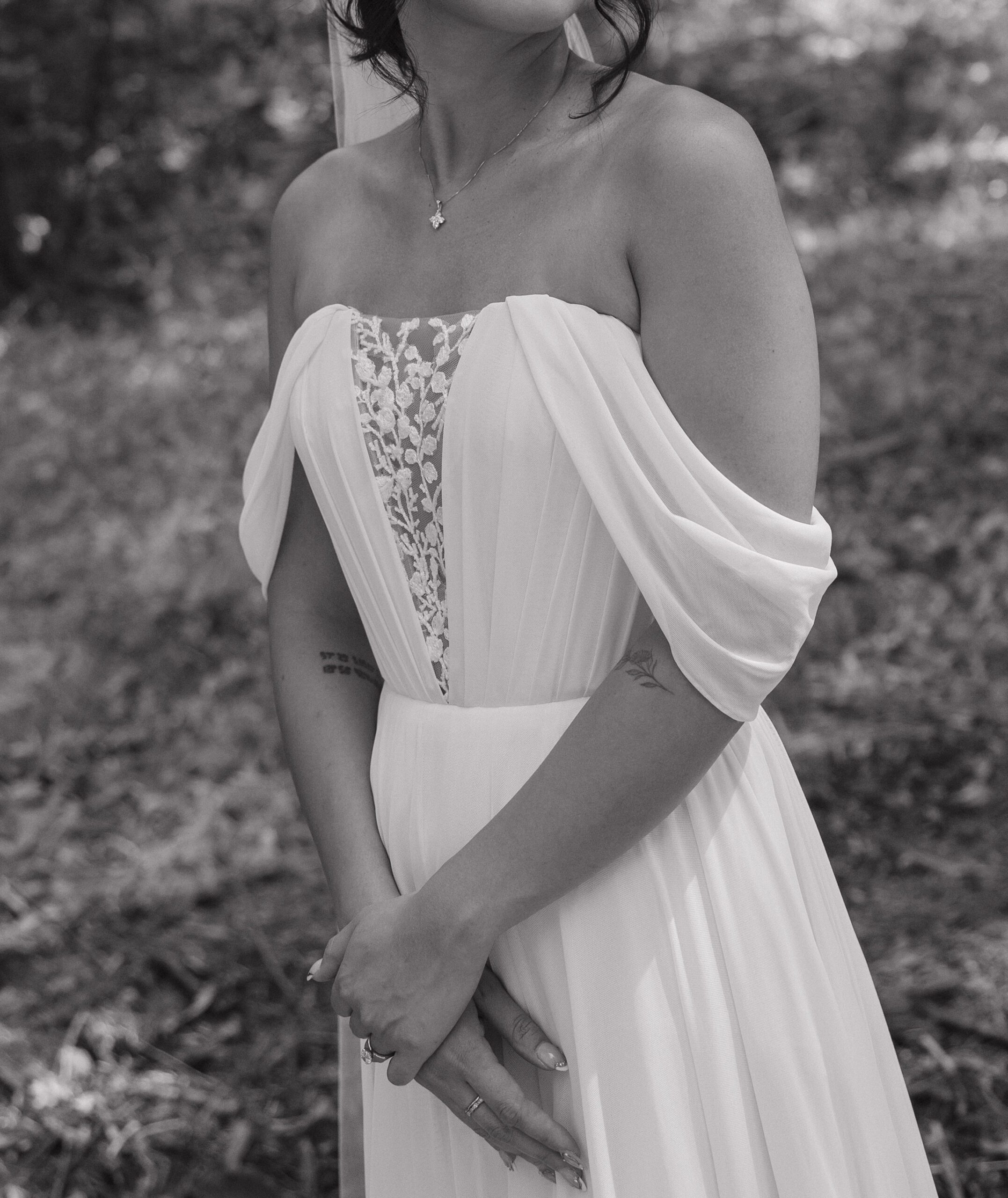 The front of a bride's intimate wedding dress