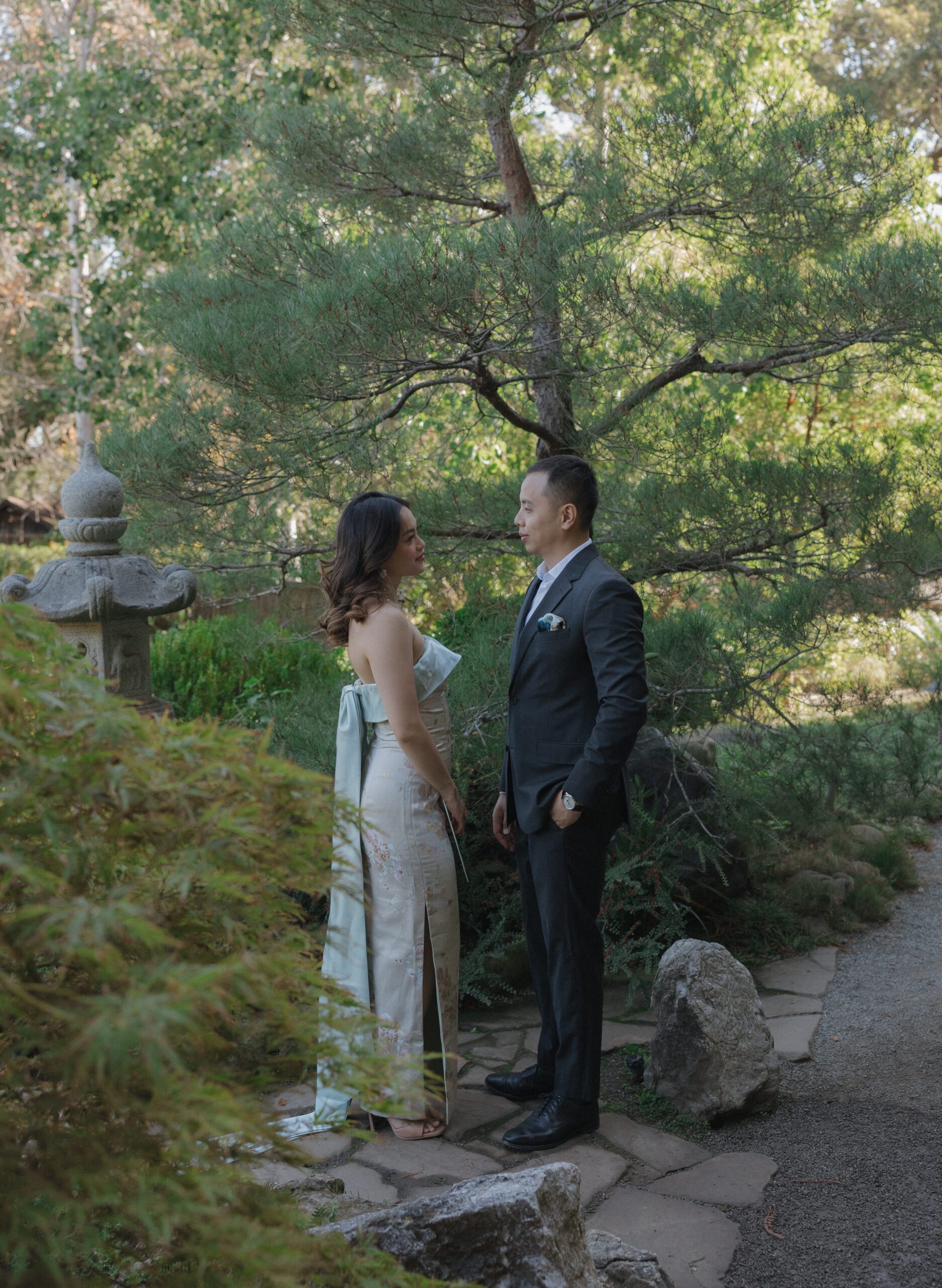 A couple posing for engagement photos at Hakone Estate and Gardens