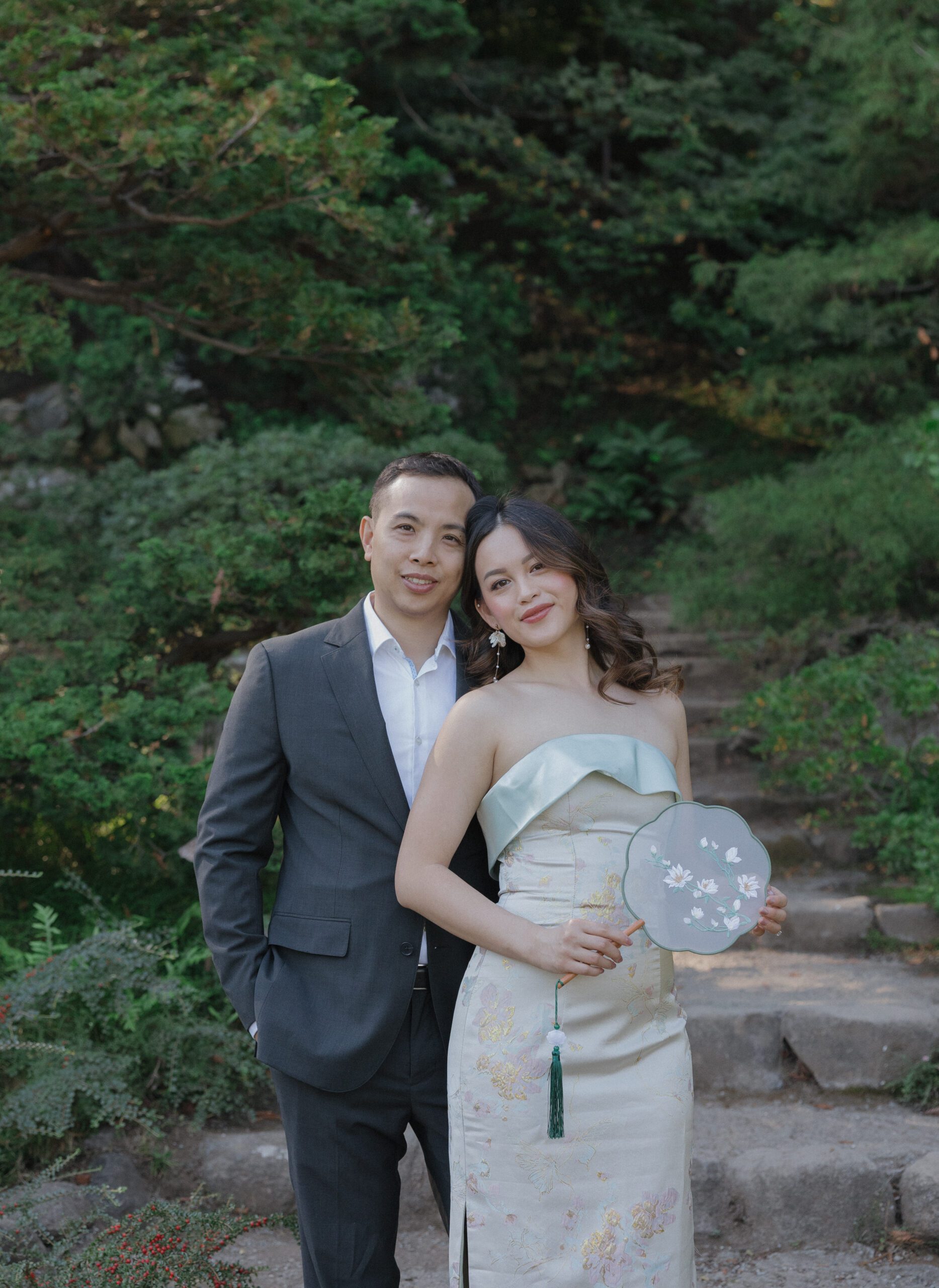 A couple posing for engagement photos at Hakone Estate and Gardens