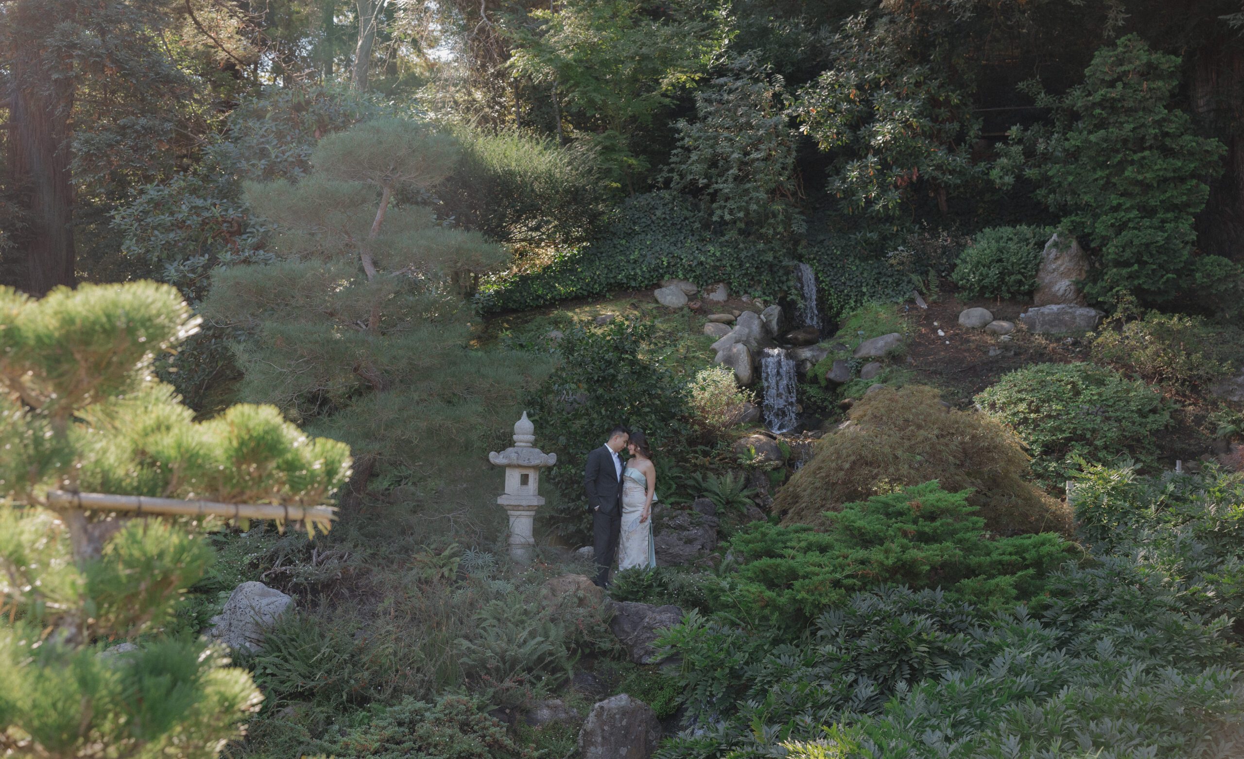 A couple standing in the gardens at Hakone Estate and Gardens