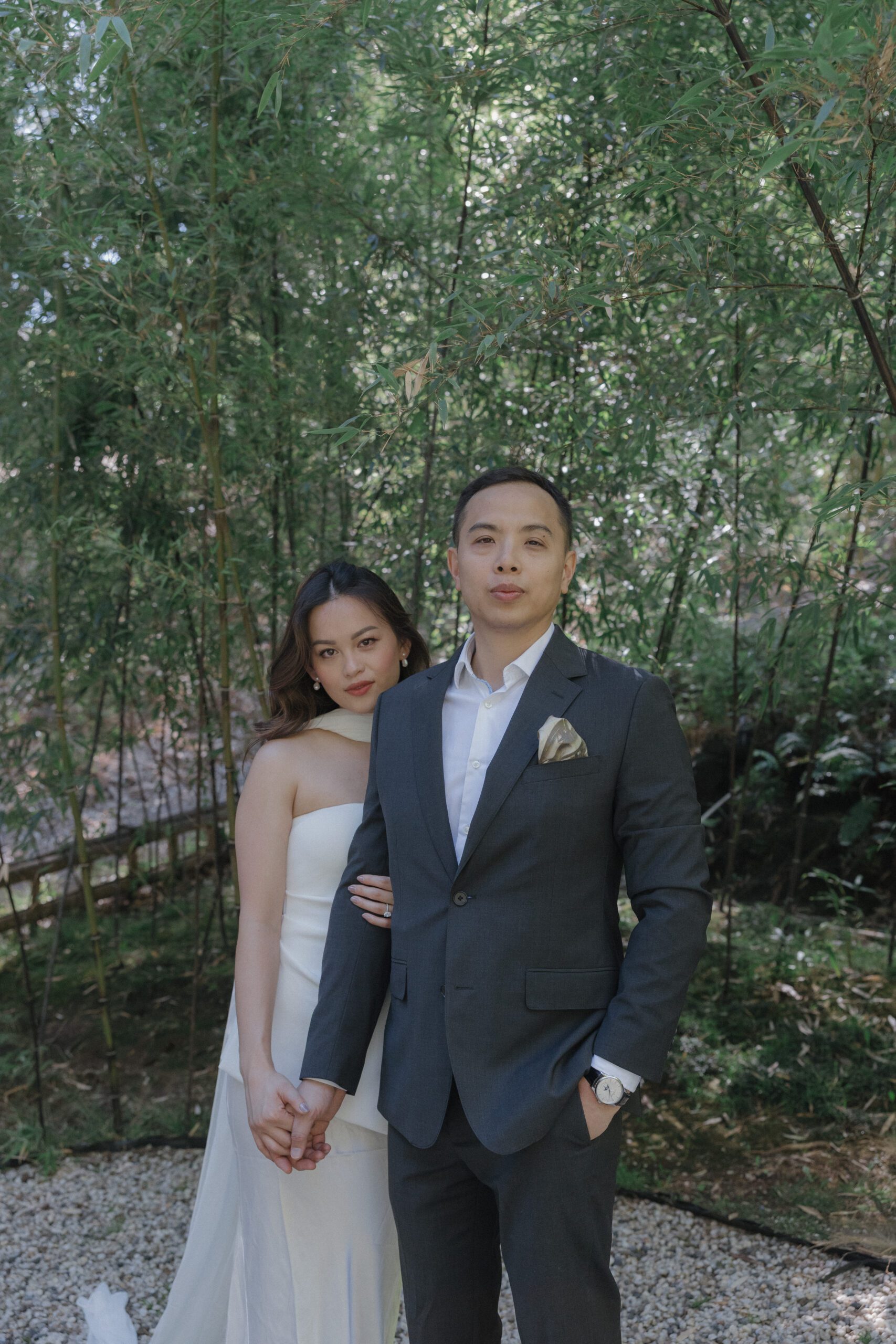 A couple posing for engagement photos in Hakone Estate and Gardens