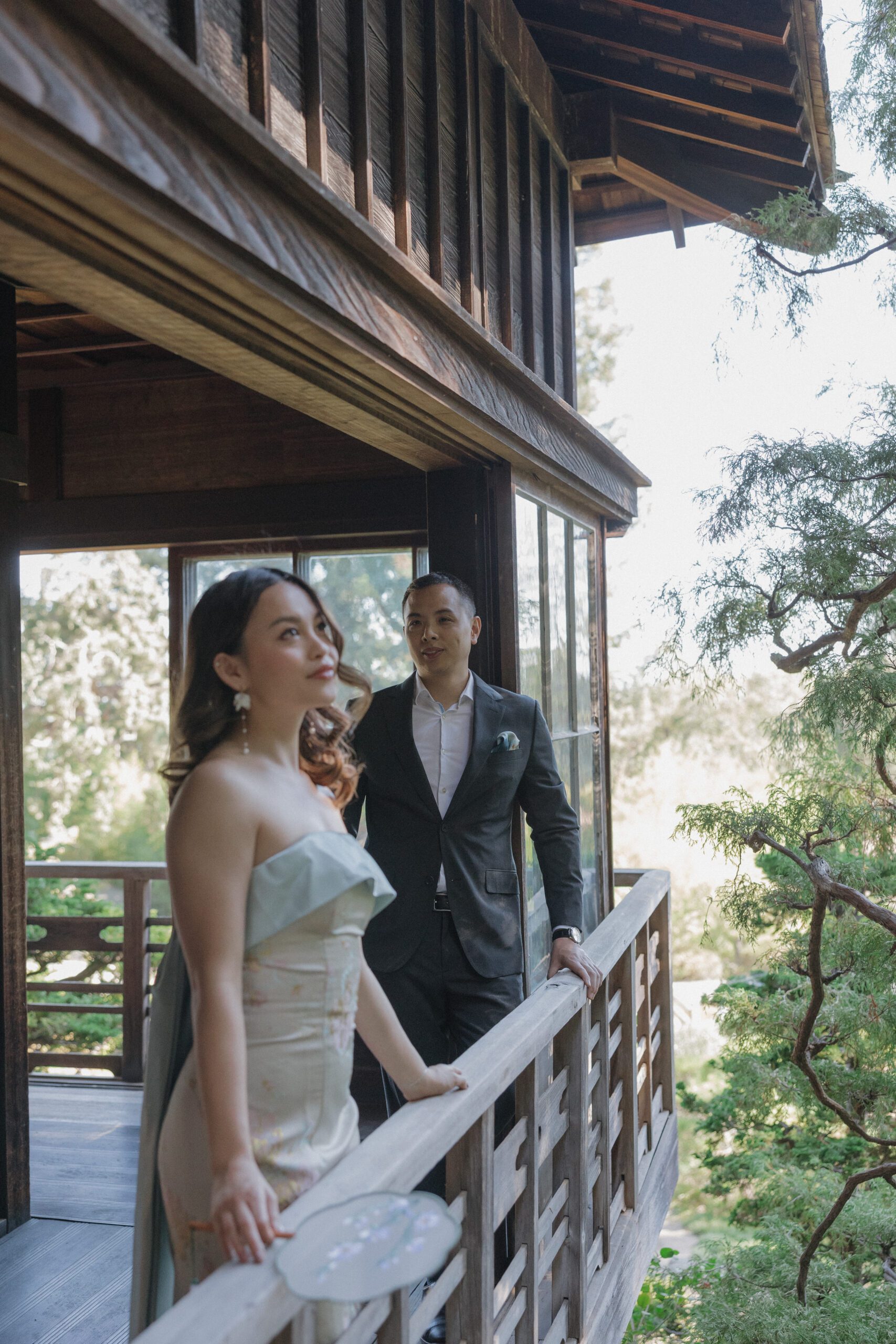 A man looking at his fiancee during engagement photos