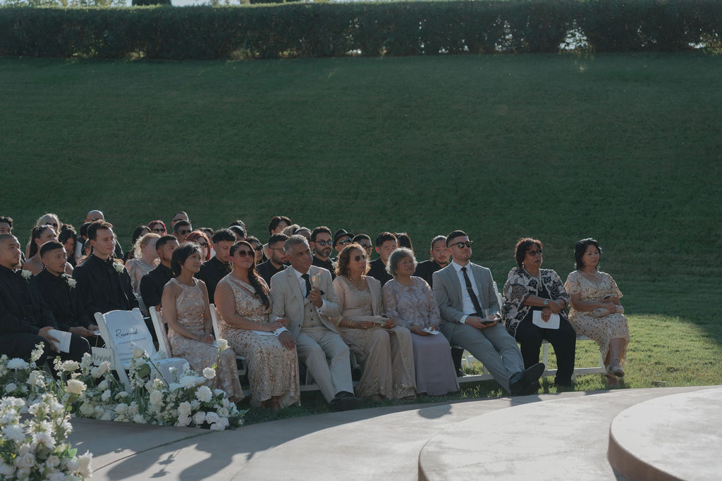 Guests watching a wedding ceremony