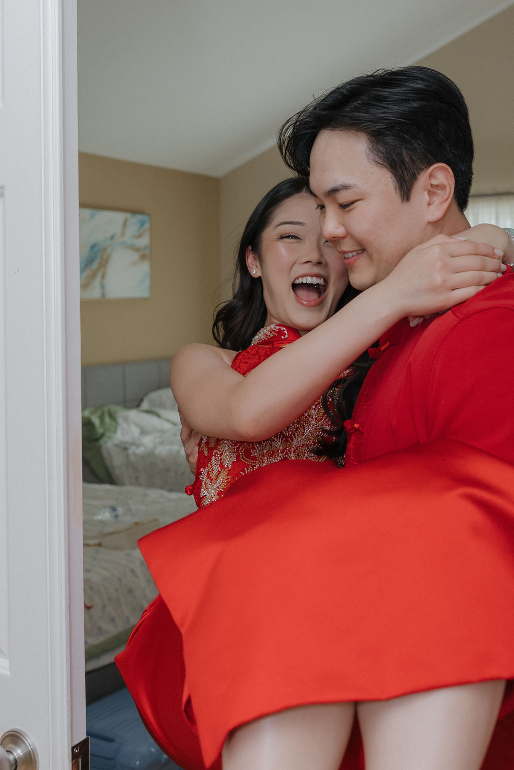 A wedding couple heading downstairs for a tea ceremony before their wedding