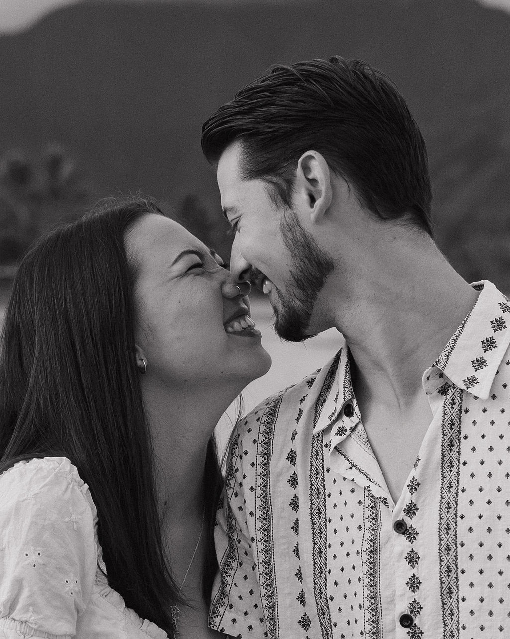 A couple leaning in for a kiss