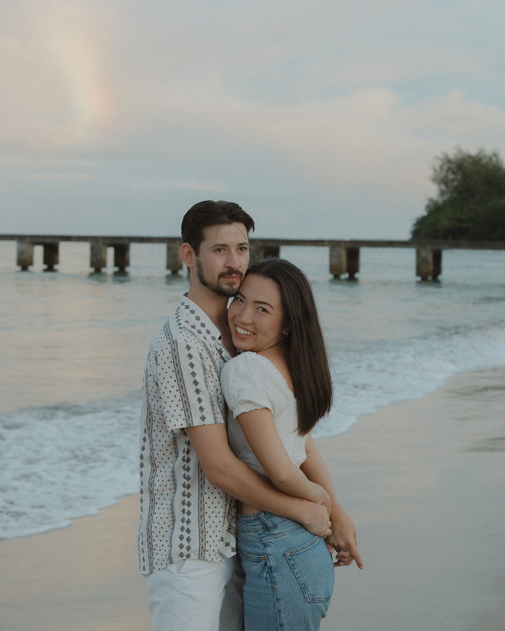 A couple at Hanalei Bay Pier, documented by a Kauai photographer