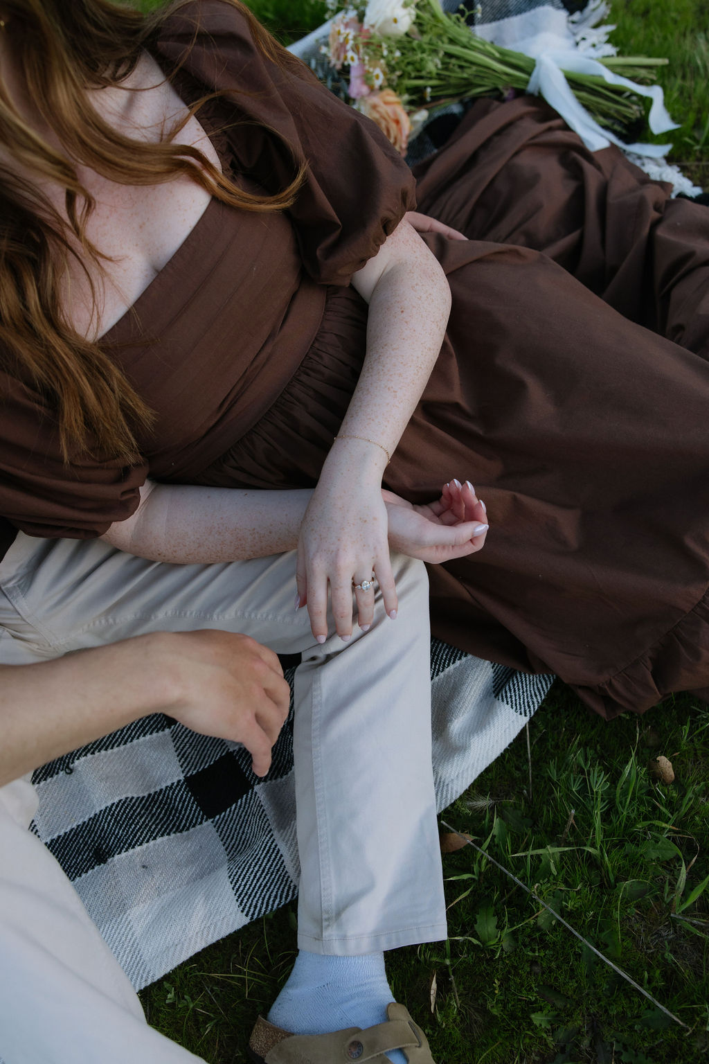 A couple on a picnic blanket in El Dorado Hills