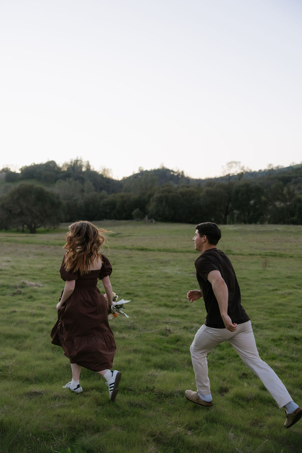 A couple running during an El Dorado Hills engagement