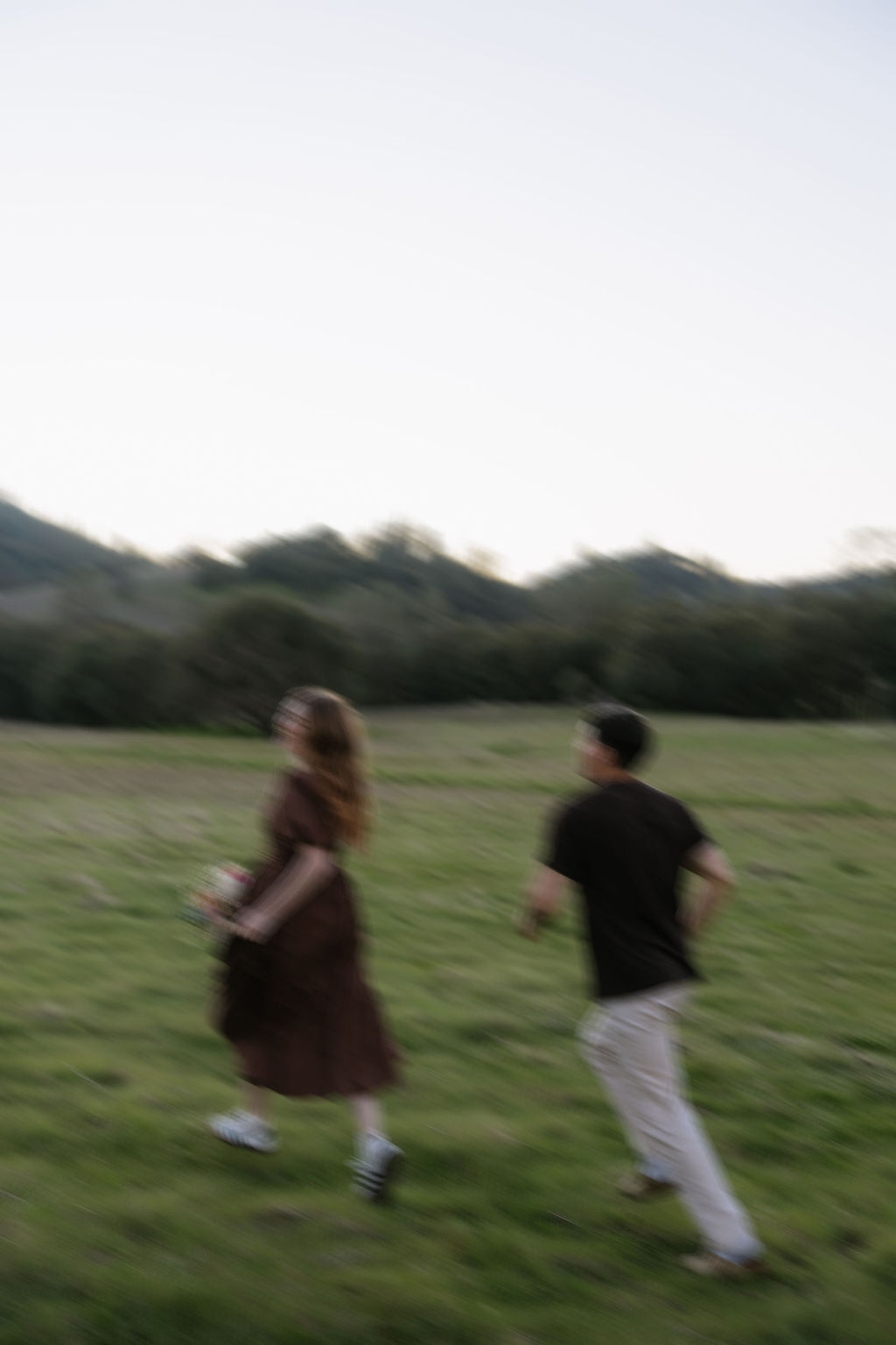 A couple running during an El Dorado Hills engagement