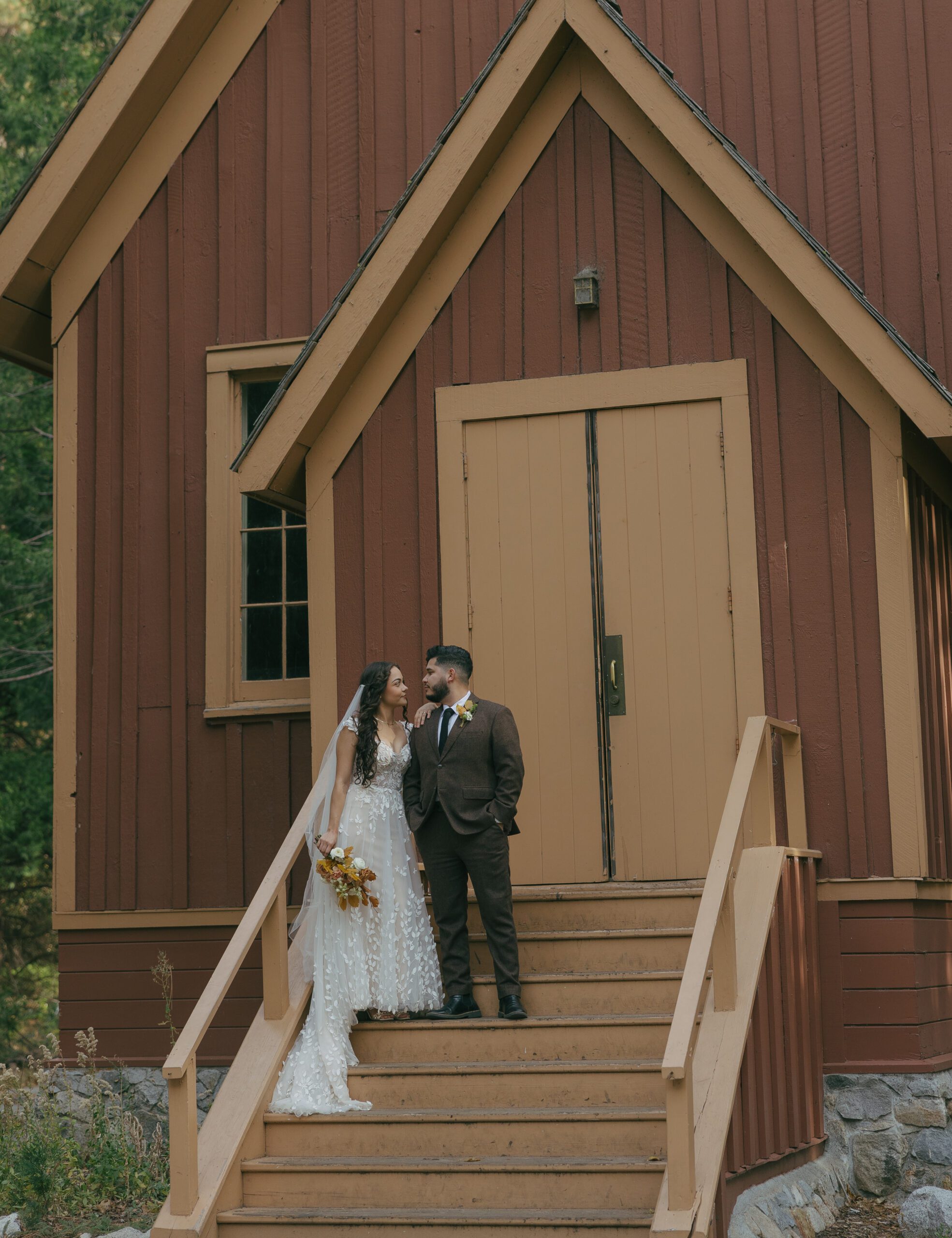 A couple at a chapel in Yosemite that they chose as their Northern California wedding location