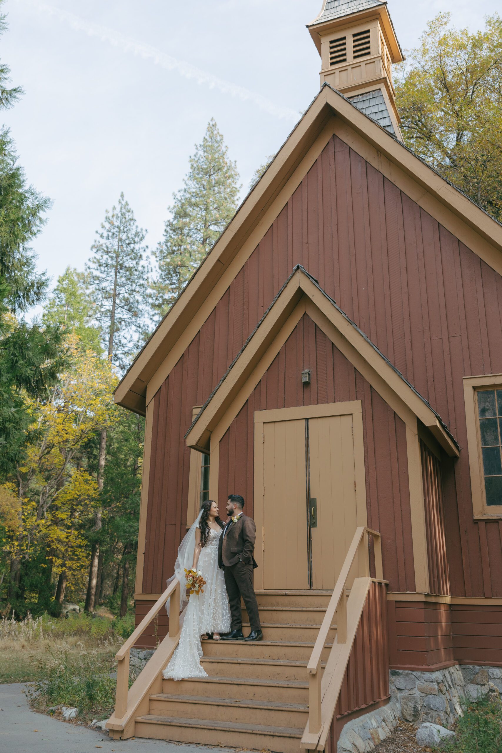 A couple at a chapel in Yosemite that they chose as their Northern California wedding location