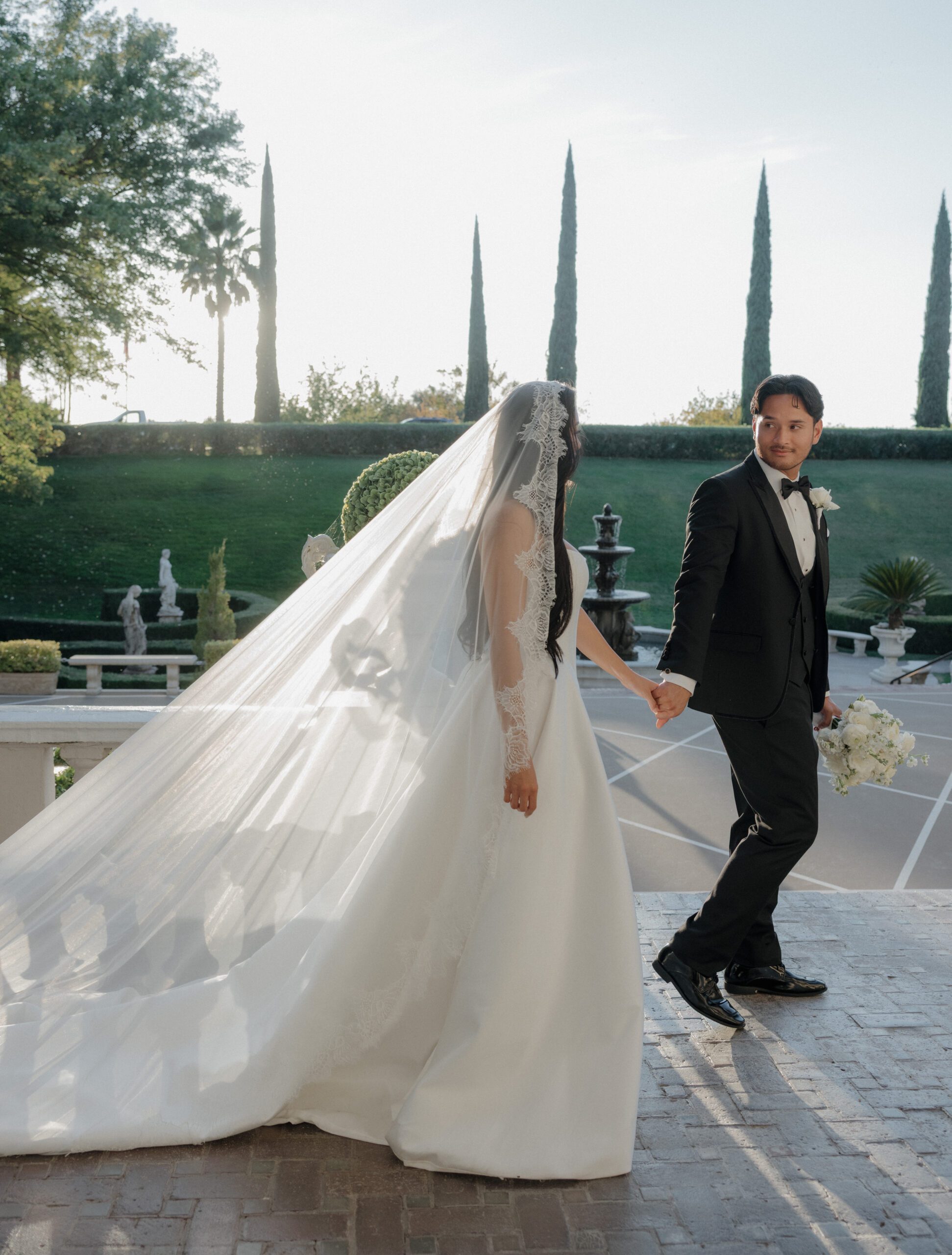 A bride and groom posing for wedding photos at their NorCal wedding venue